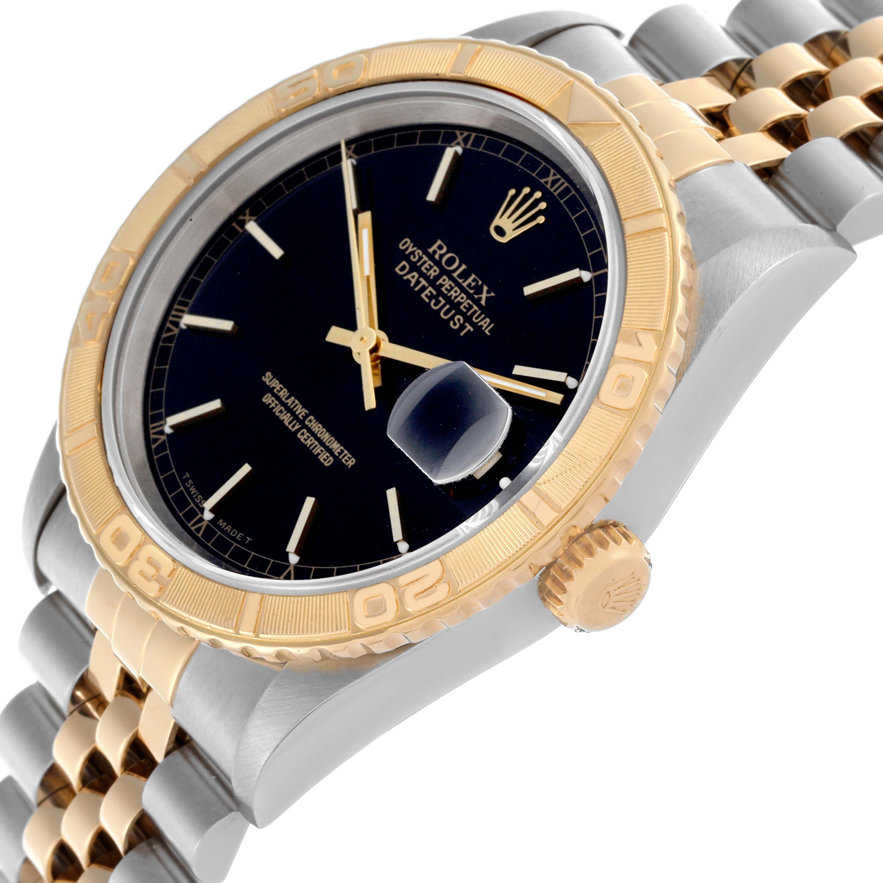 The Rolex Turn-o-Graph 16263 Men
s Steel and Gold (two tone) Black Dial 16263 Men
s Steel and Gold (two tone) Black Dial watch is shown at an angle highlighting the bezel, dial, crown, and part of the bracelet.