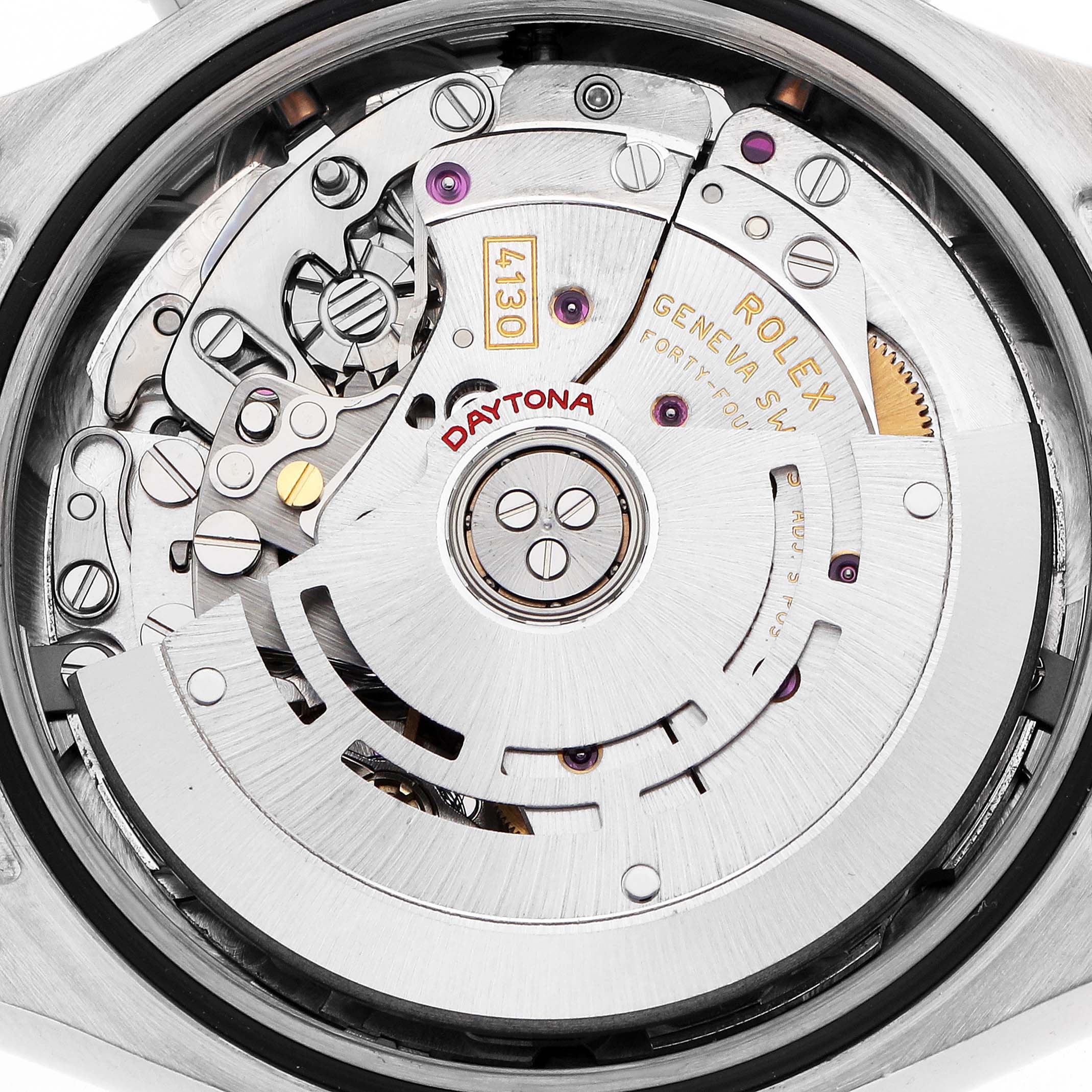 The image shows the inner mechanism of a Rolex Daytona 116509 Men
s White Gold Silver Dial watch from a rear angle, highlighting its intricate movement.