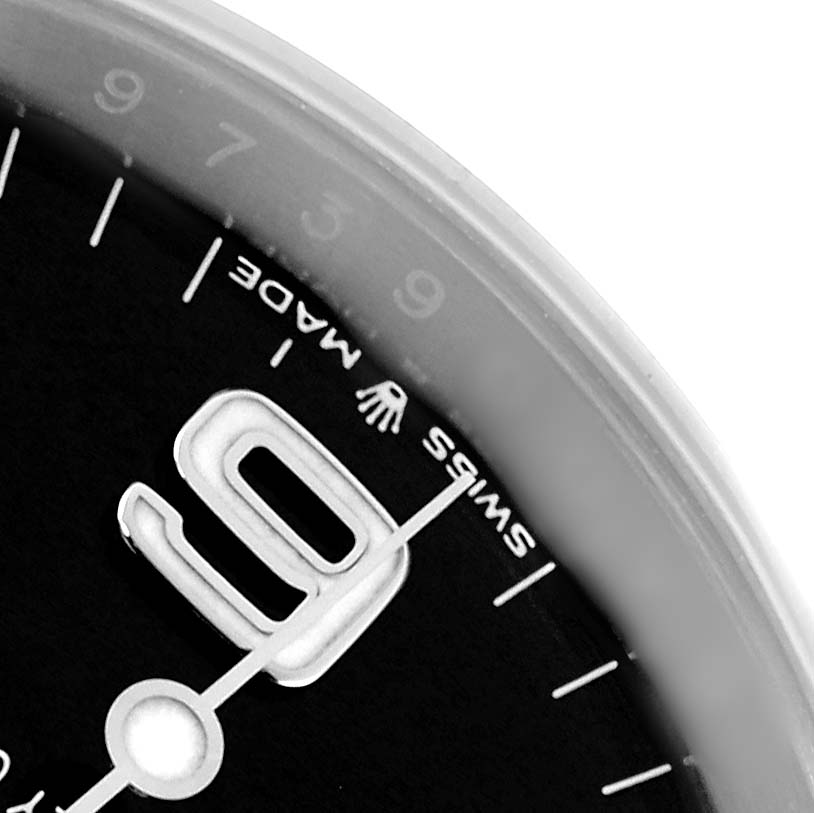 The image shows a close-up of the dial, focusing on the "9" and "SWISS MADE" parts of the Rolex Explorer 124270 Men
s Stainless Steel Black Dial watch.