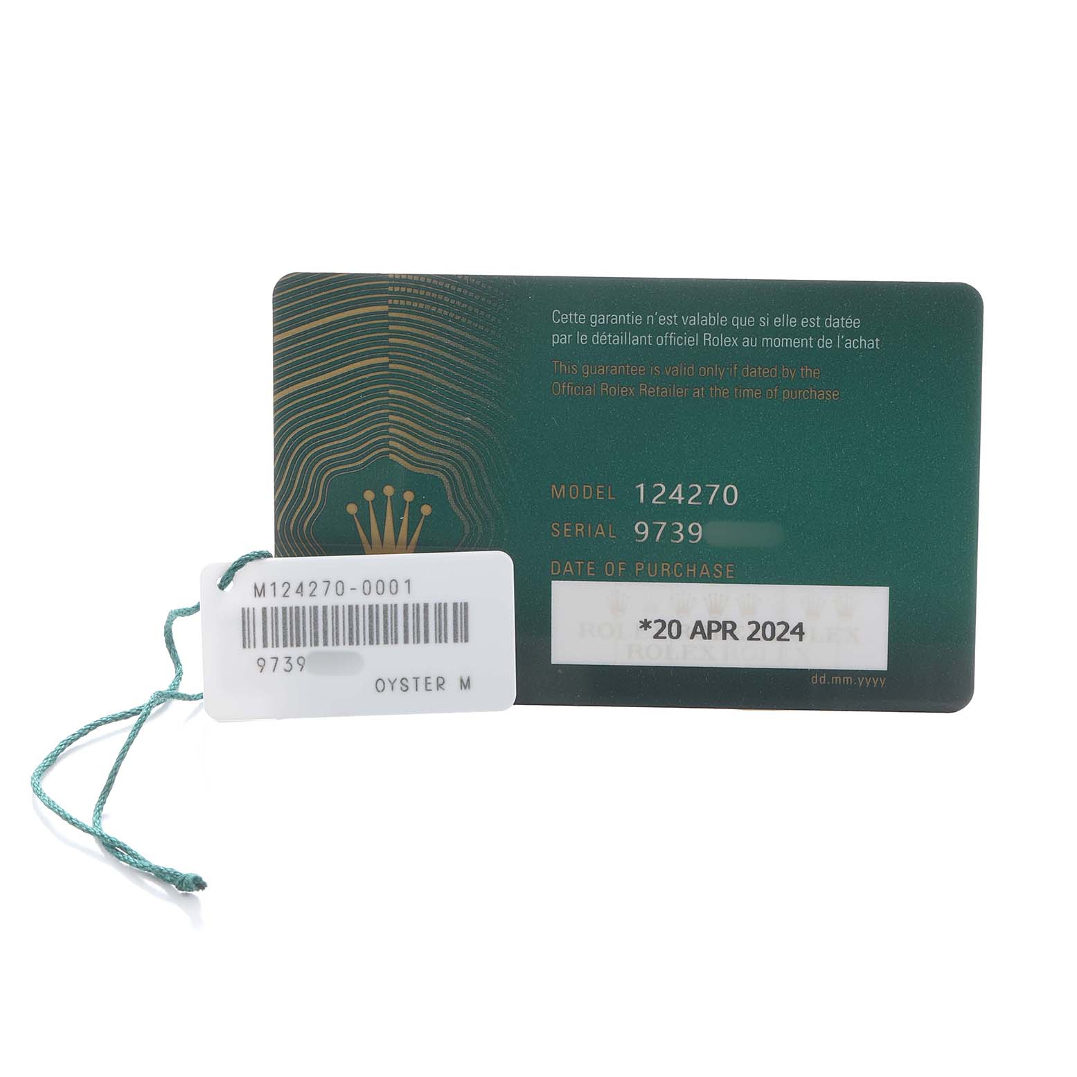 The image shows a warranty card and tag for a Rolex Explorer 124270 Men
s Stainless Steel Black Dial model, highlighting the model number, serial, and purchase date.