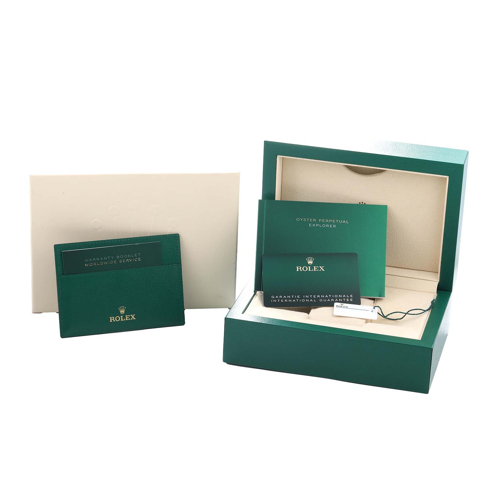 The image shows the packaging and documents for a Rolex Explorer 124270 Men
s Stainless Steel Black Dial, including the box and warranty booklet.