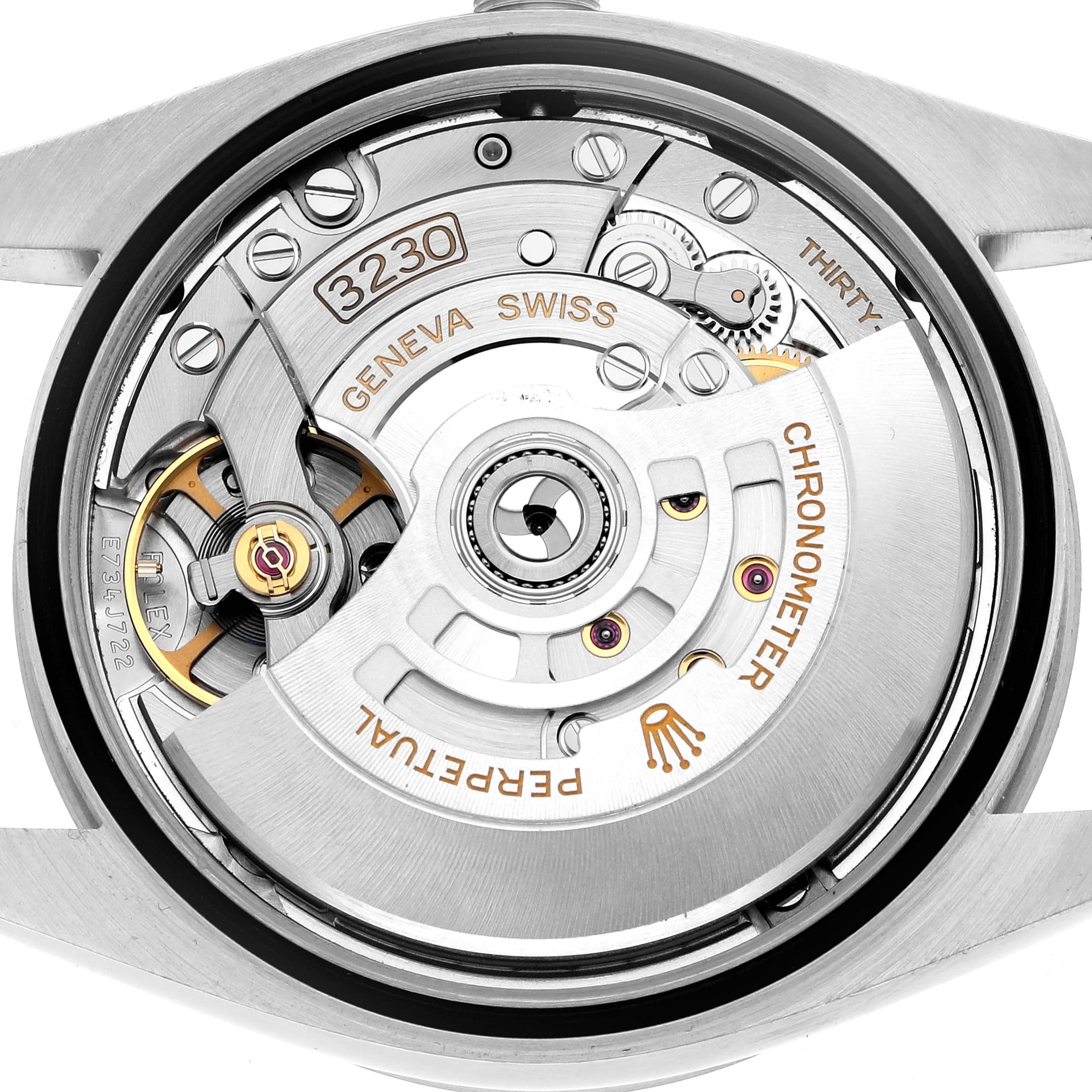 The image shows a close-up, top-down view of the Rolex Explorer 124270 Men
s Stainless Steel Black Dial
s movement, featuring the intricate mechanics and rotor.