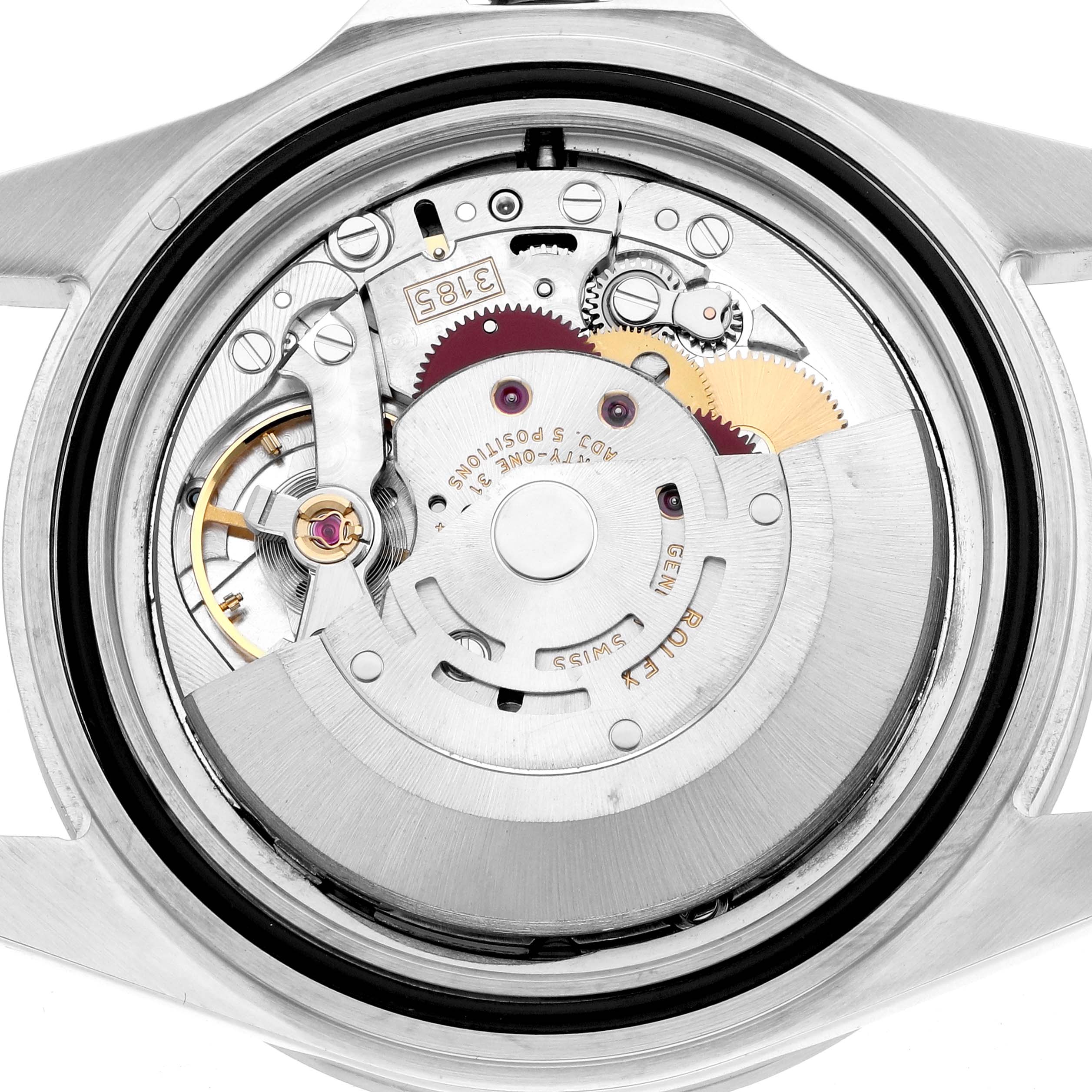 The image shows the open case back of a Rolex Explorer 16570 Men
s Stainless Steel Black Dial, revealing its intricate movement parts.