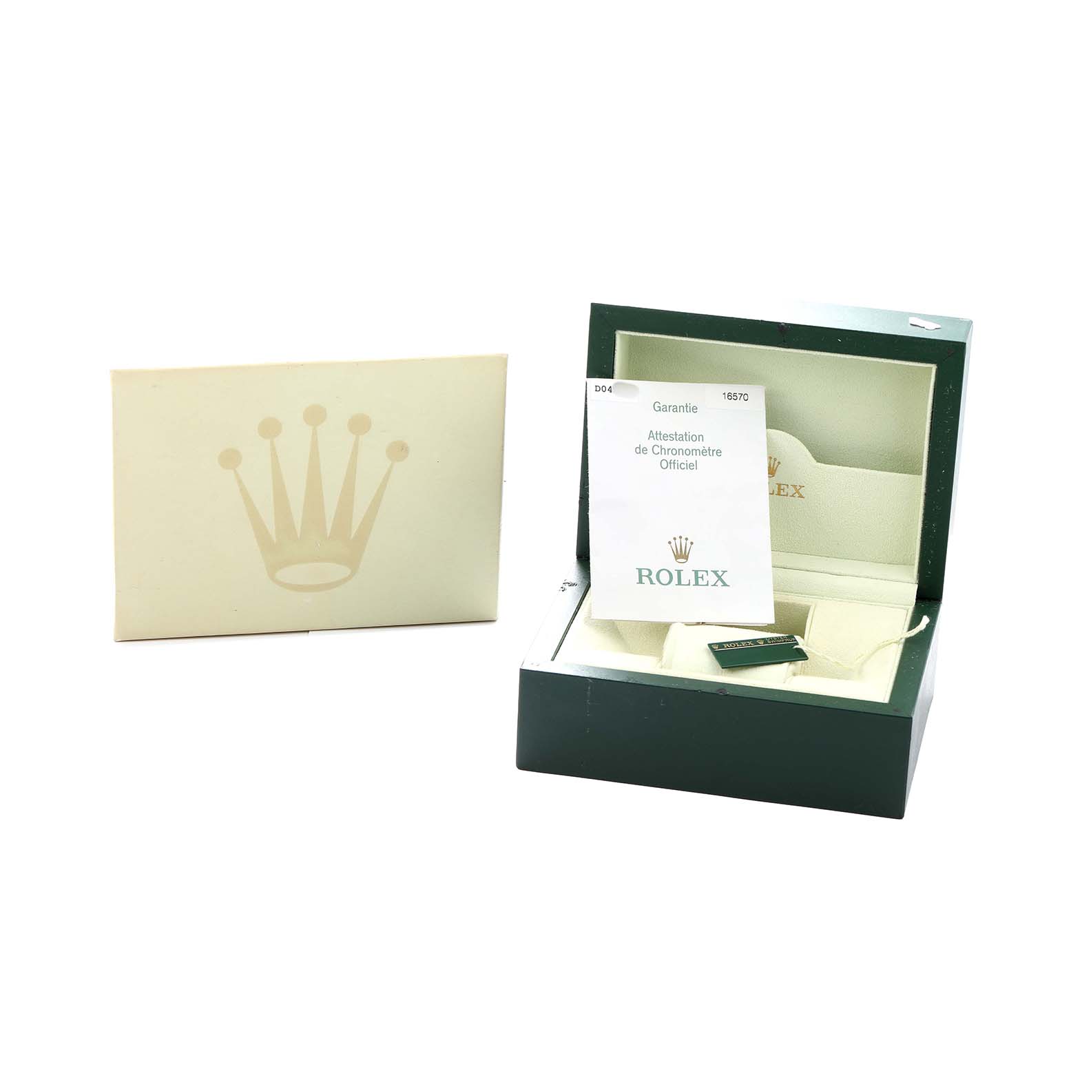 The image shows a Rolex Explorer 16570 Men
s Stainless Steel Black Dial watch box open, with documents and tags, viewed from the front.