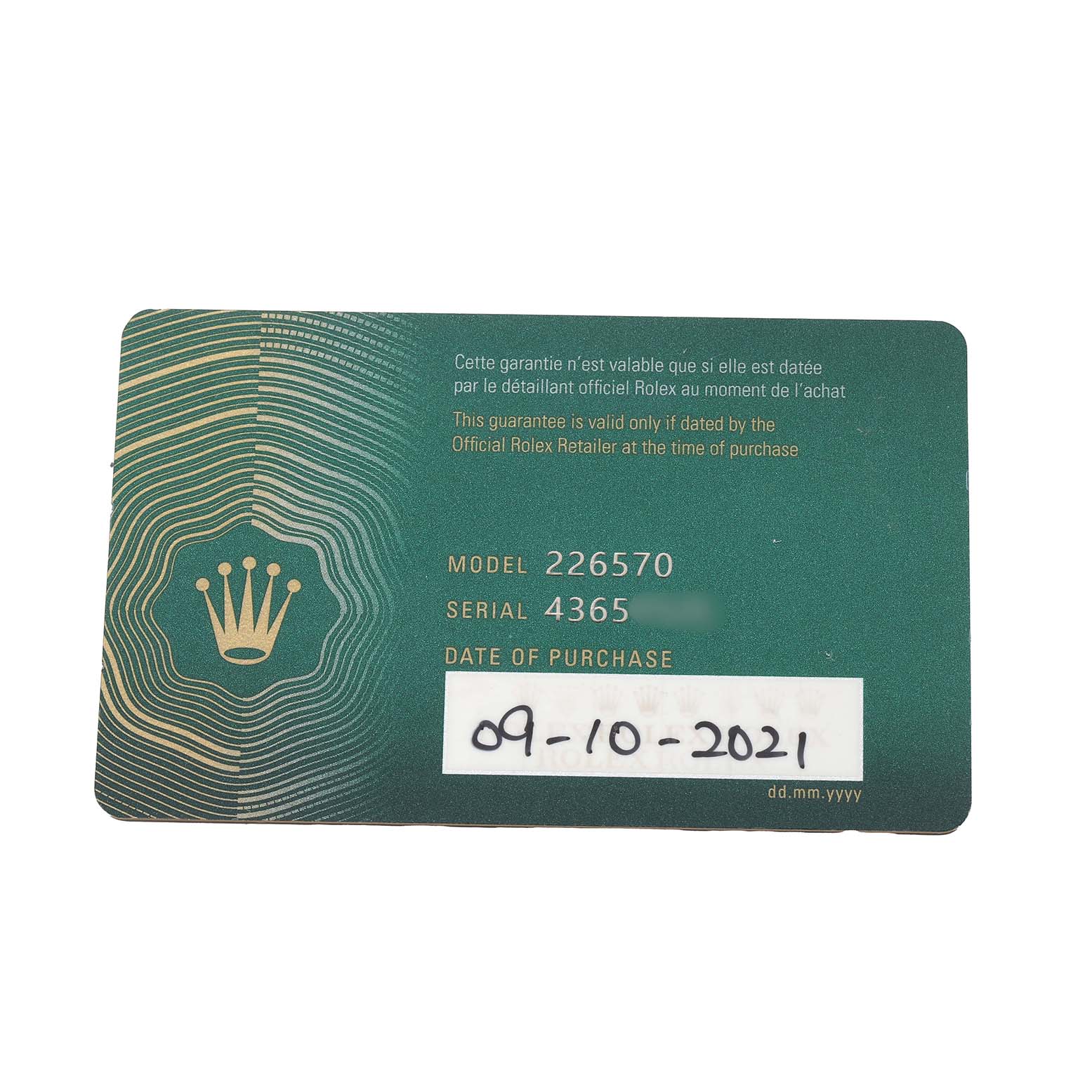 The image shows a Rolex warranty card for the Explorer model, displaying the model number, serial number, and purchase date.