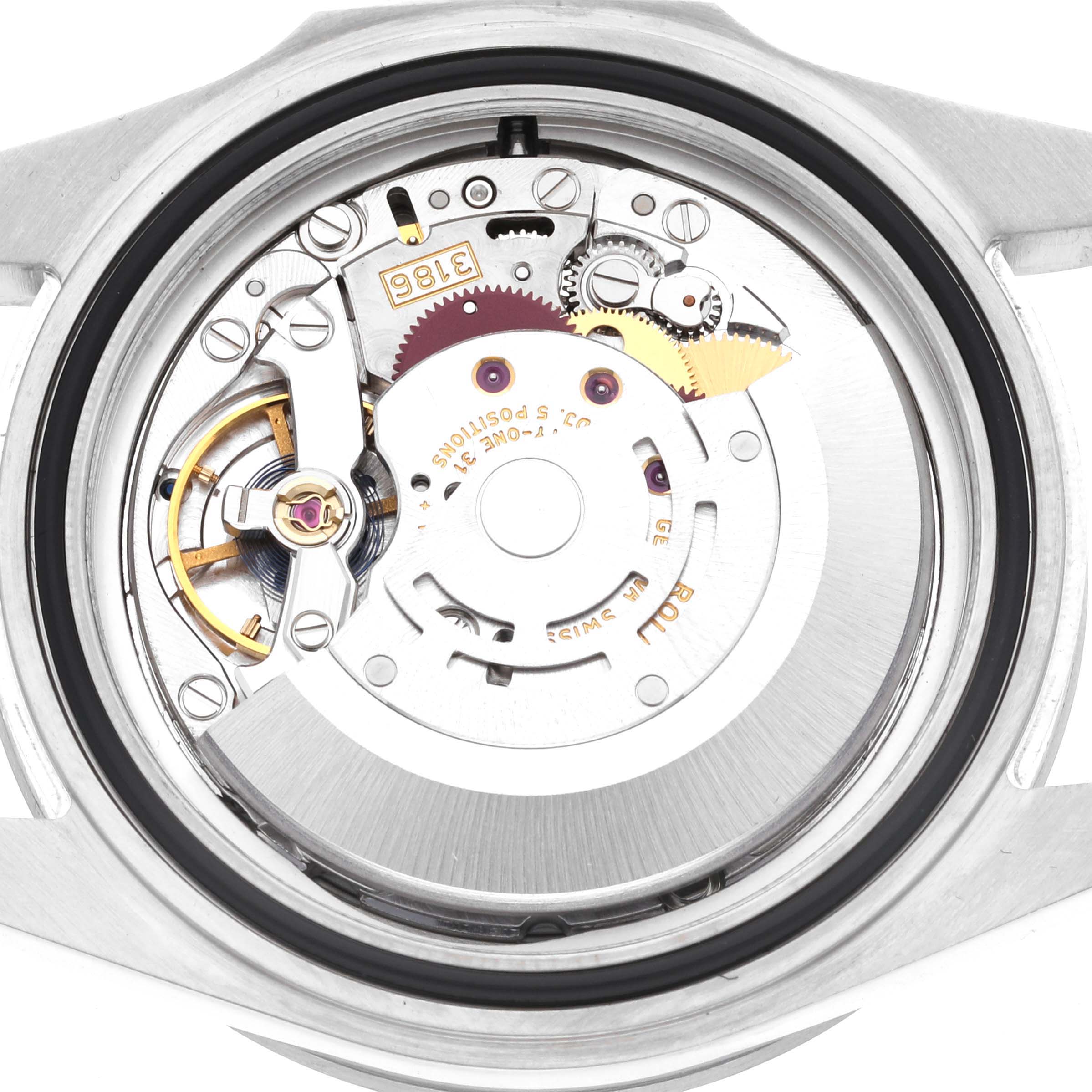 The image shows the Rolex Explorer 16570T Men's Stainless Steel Black Dial 16570T Men's Stainless Steel Black Dial's movement from the back, displaying gears and mechanical components.