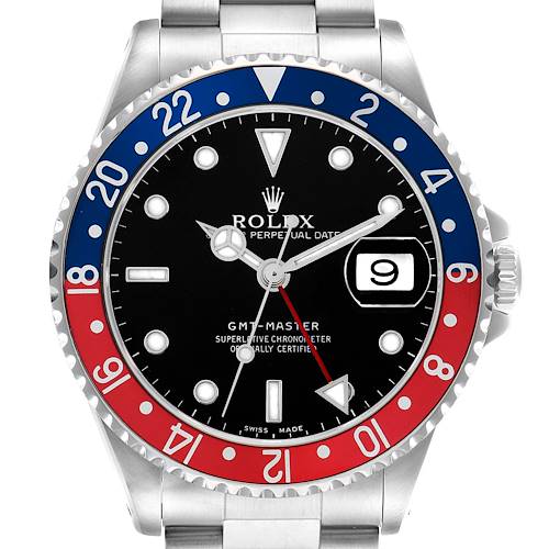 The Rolex GMT-Master 16700 Men
s Stainless Steel Black Dial watch is shown from a front angle, highlighting the bezel and dial with red and blue accents.