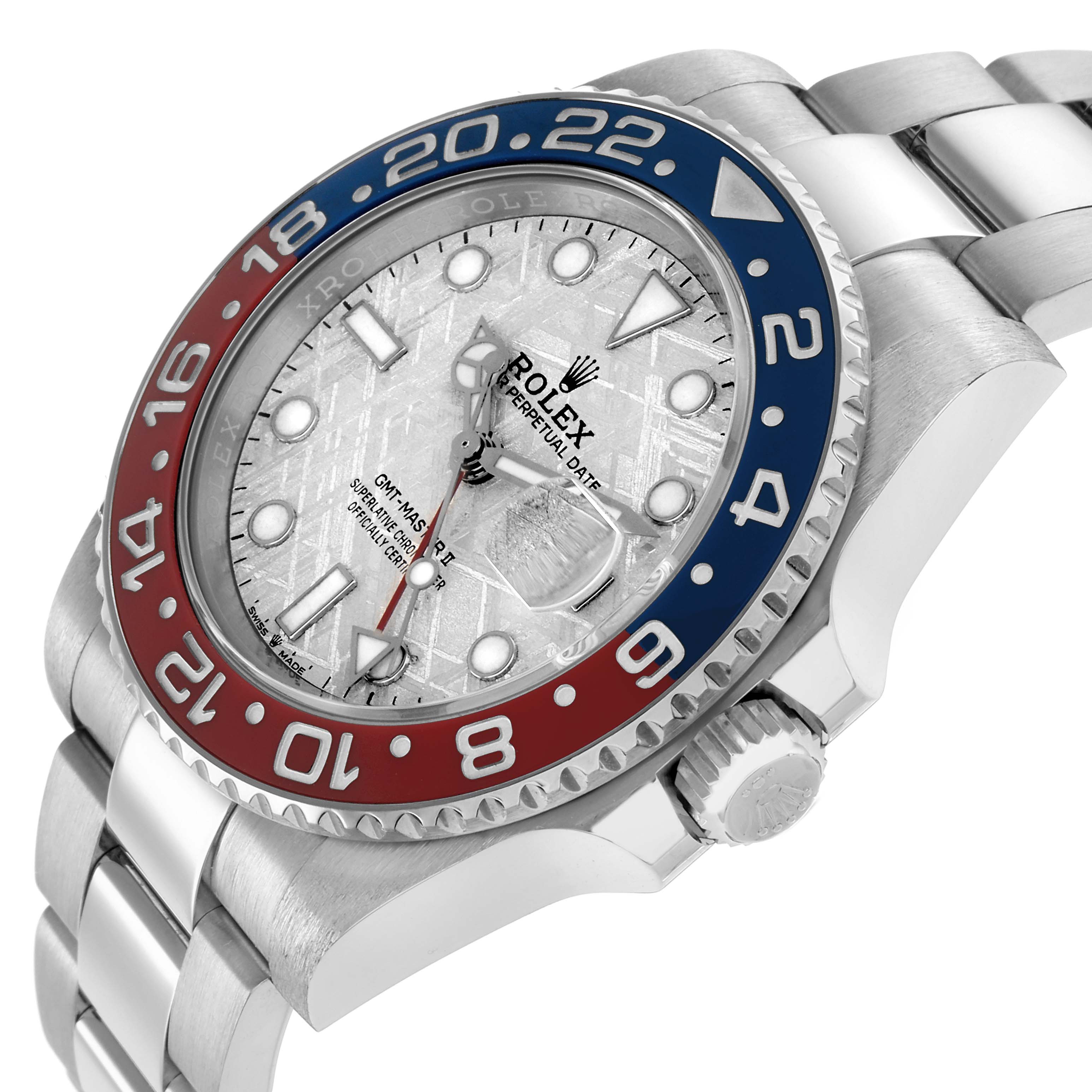 The Rolex GMT-Master 126719 Men
s White Gold Silver Dial watch is shown at an angle displaying the dial, bezel, side crown, and part of the bracelet.
