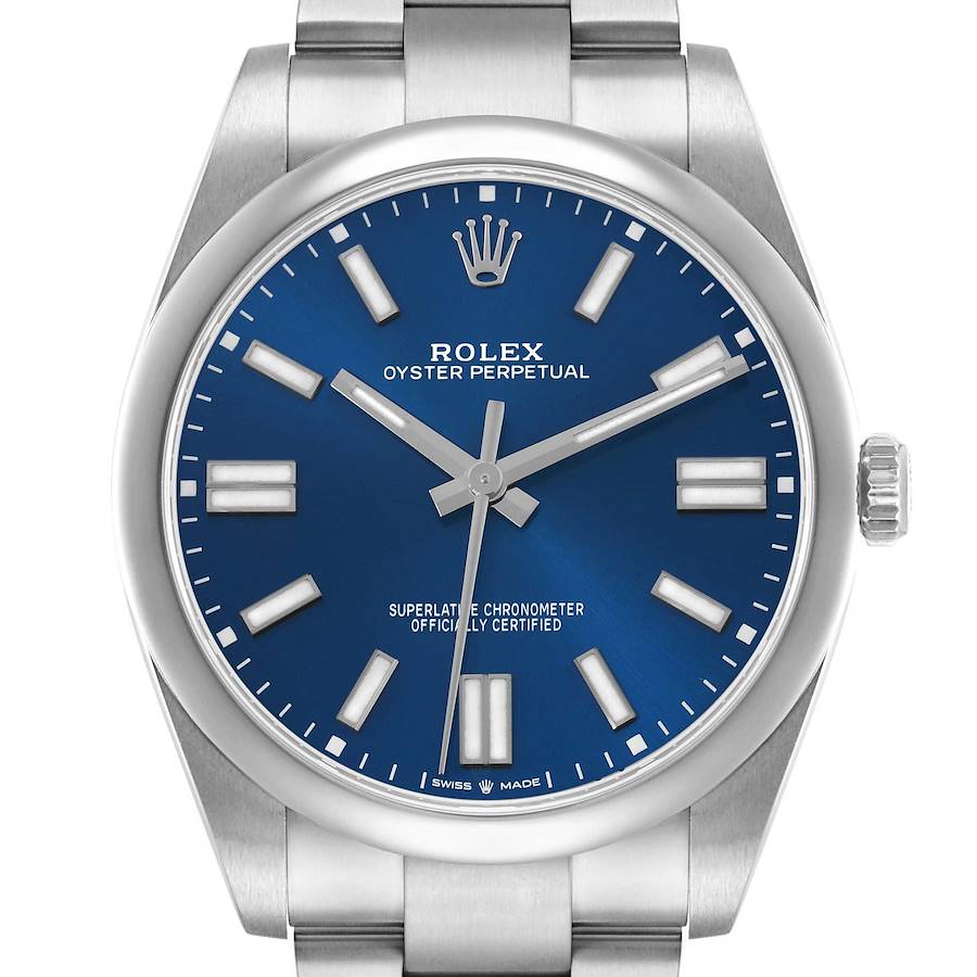 The image shows a front view of a Rolex Oyster Perpetual 124300 Men's Stainless Steel Blue Dial, highlighting the dial, bezel, crown, and part of the bracelet.