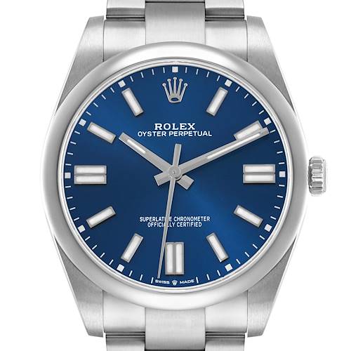 The Rolex Oyster Perpetual 124300 Men's Stainless Steel Blue Dial watch is shown from a front angle, displaying its blue dial, hour markers, and part of the bracelet.