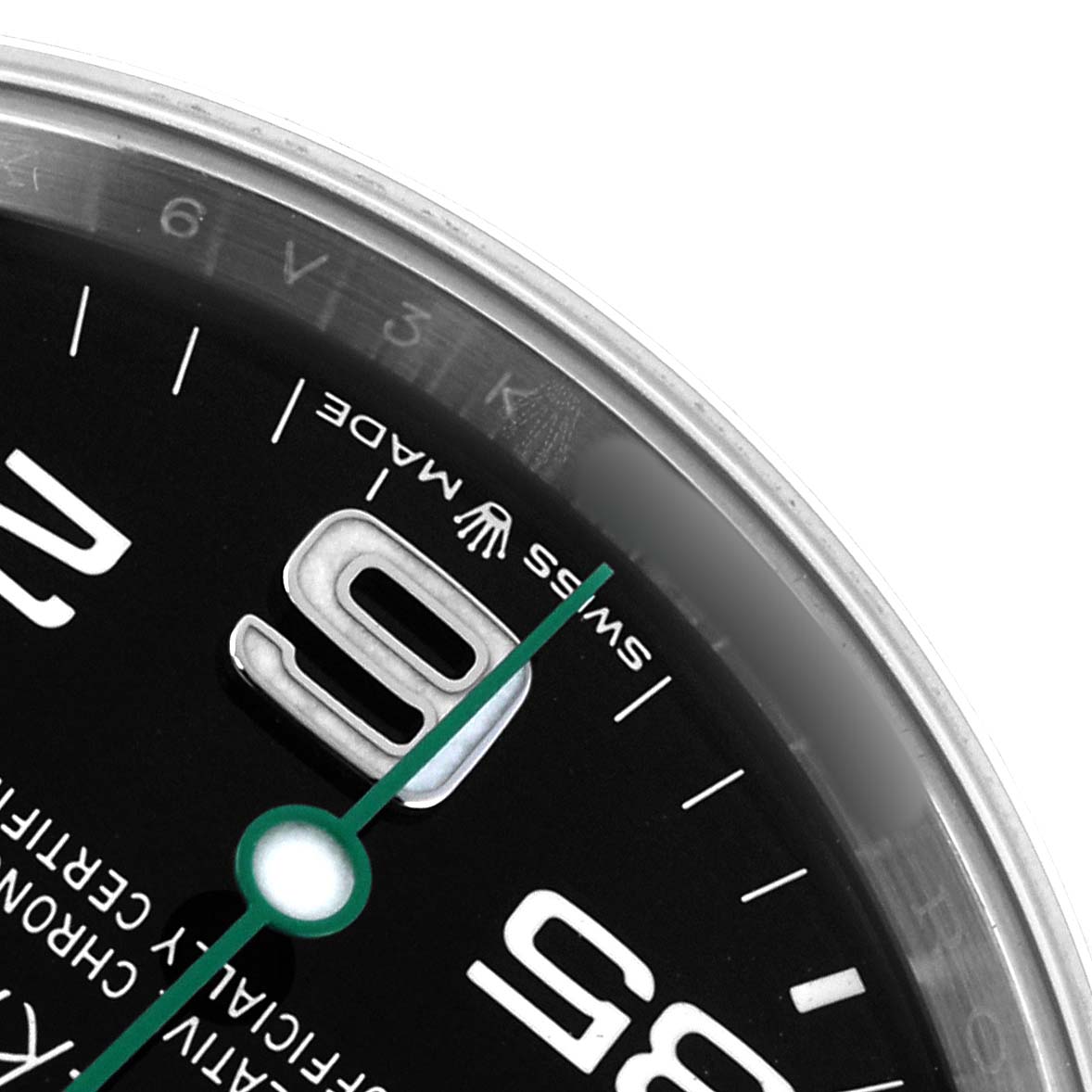 The image shows a close-up of the Rolex Air-King 126900 Men
s Stainless Steel Black Dial watch face, highlighting the 9 marker, "Swiss Made" text, and part of the minute hand.
