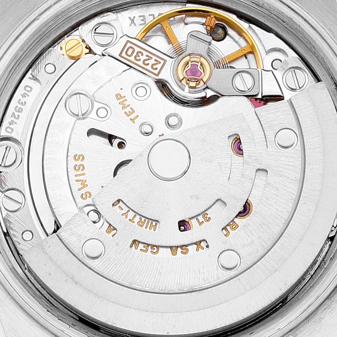 This image shows a close-up view of the movement mechanism in a Rolex Oyster Perpetual 76193 Women's Steel and Gold (two tone) Champagne Dial 76193 Women's Steel and Gold (two tone) Champagne Dial watch.