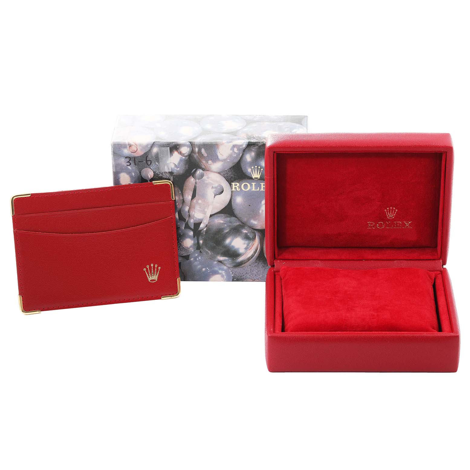 The image shows a Rolex Oyster Perpetual 76193 Women's Steel and Gold (two tone) Champagne Dial 76193 Women's Steel and Gold (two tone) Champagne Dial watch box and cardholder, both in red, with the exterior box also visible.