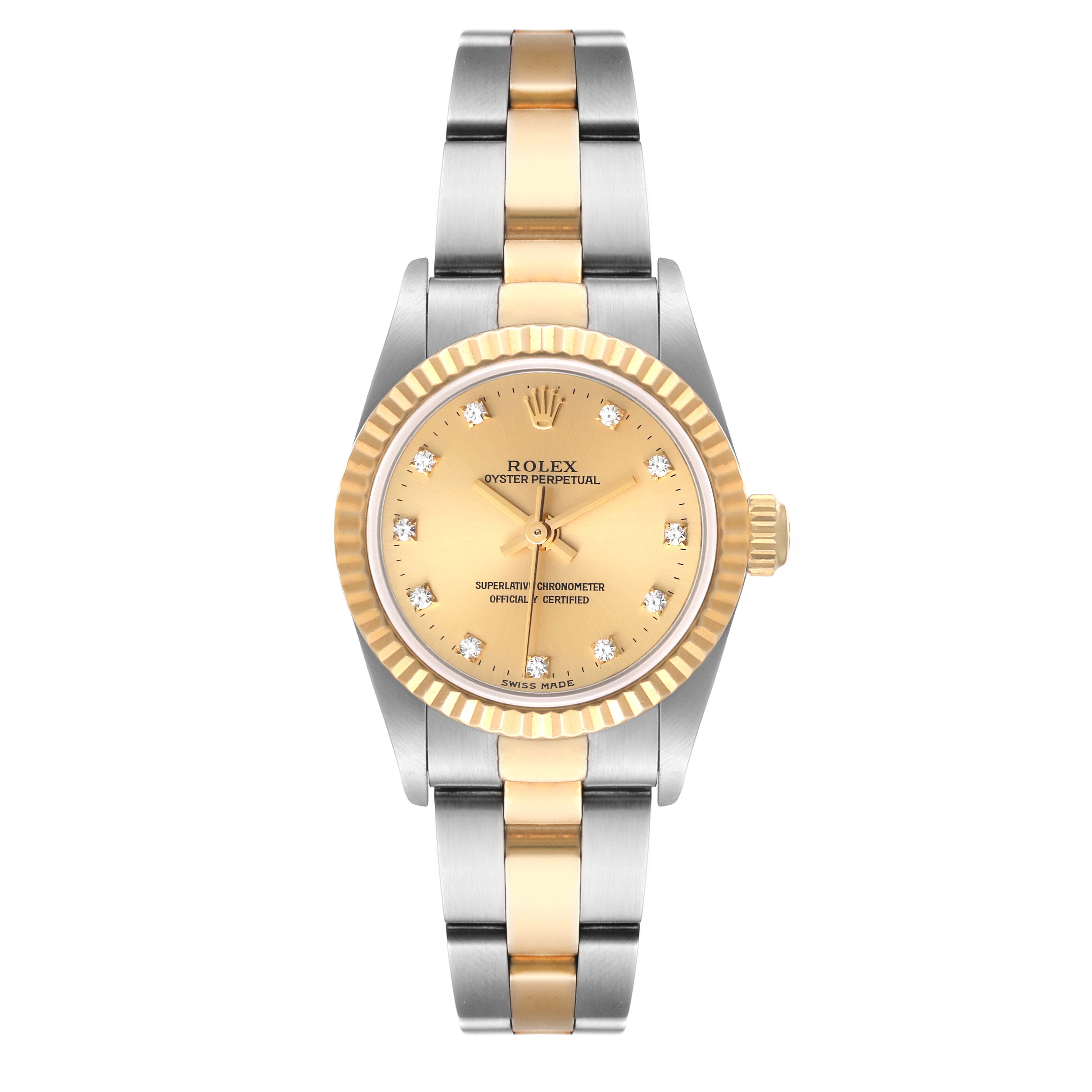 The image shows a front view of a Rolex Oyster Perpetual 76193 Women's Steel and Gold (two tone) Champagne Dial 76193 Women's Steel and Gold (two tone) Champagne Dial watch with a two-tone bracelet and a gold dial.