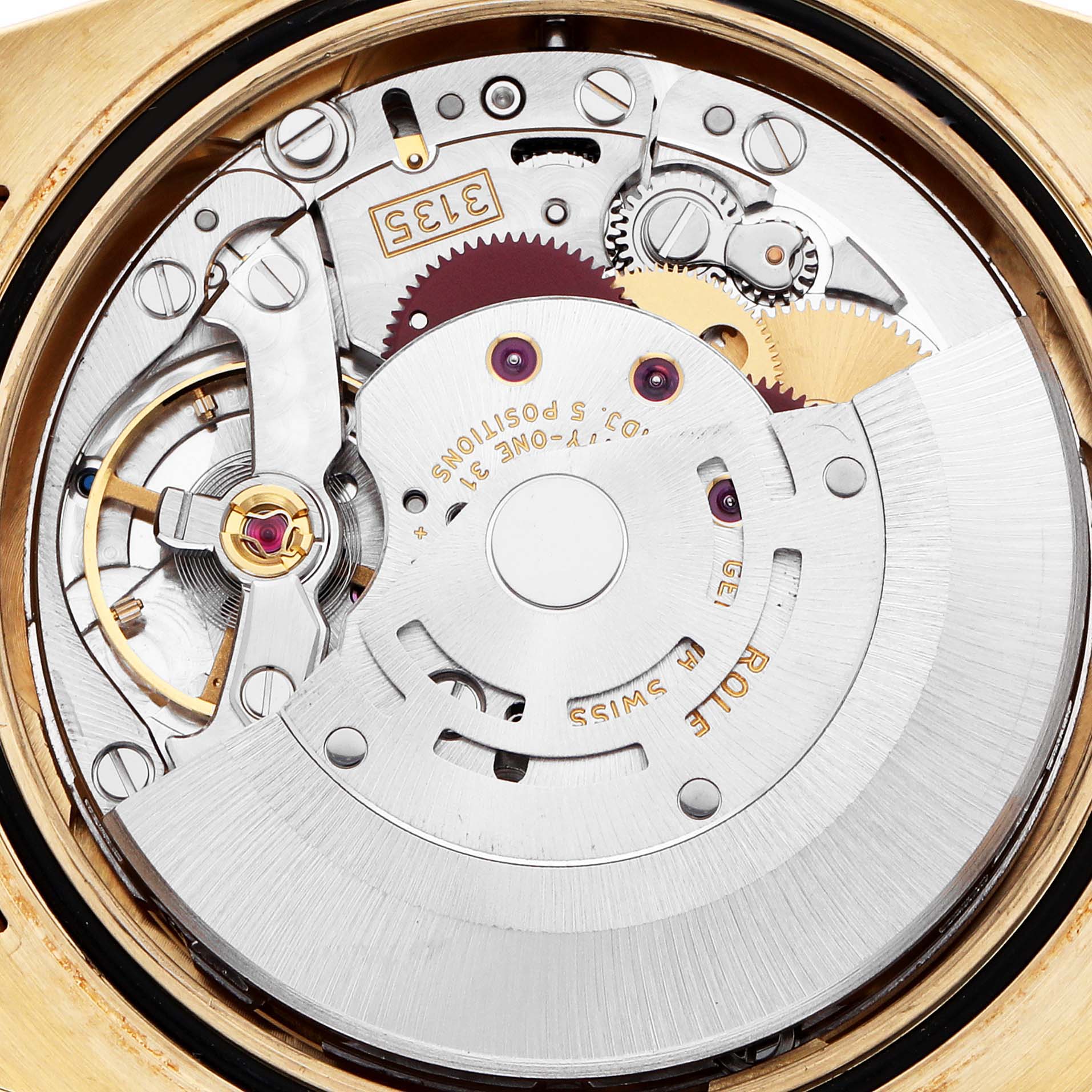 The image shows the internal mechanics of a Rolex President 116188 Men
s Yellow Gold Mother of Pearl Dial watch, highlighting gears and the rotor from a top-down angle.