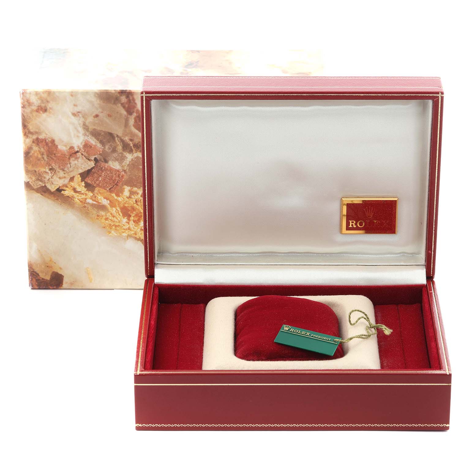The image shows a Rolex President 68279 Women's White Gold Silver Dial 68279 Women's White Gold Silver Dial model watch box with a red cushion and tag, viewed from the front.