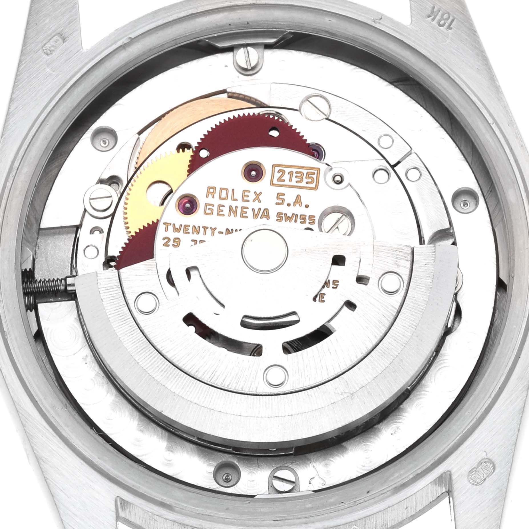 The image shows a close-up of the Rolex President 68279 Women's White Gold Silver Dial 68279 Women's White Gold Silver Dial model's inner movement, highlighting gears and the rotor.