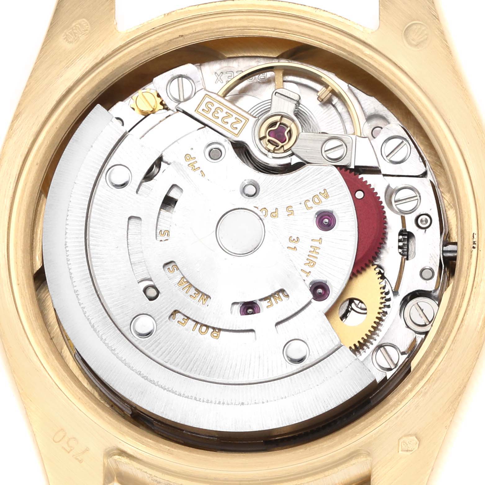 The image shows a close-up view of the movement mechanism of a Rolex President 179138 Women
s Yellow Gold Mother of Pearl Dial watch, highlighting gears and components.