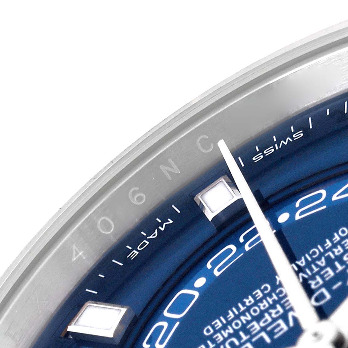 The image shows a close-up of the Rolex Sky-Dweller 326934 Men's Stainless Steel Blue Dial 326934 Men's Stainless Steel Blue Dial's watch face, focusing on the blue dial, indices, and part of the bezel.