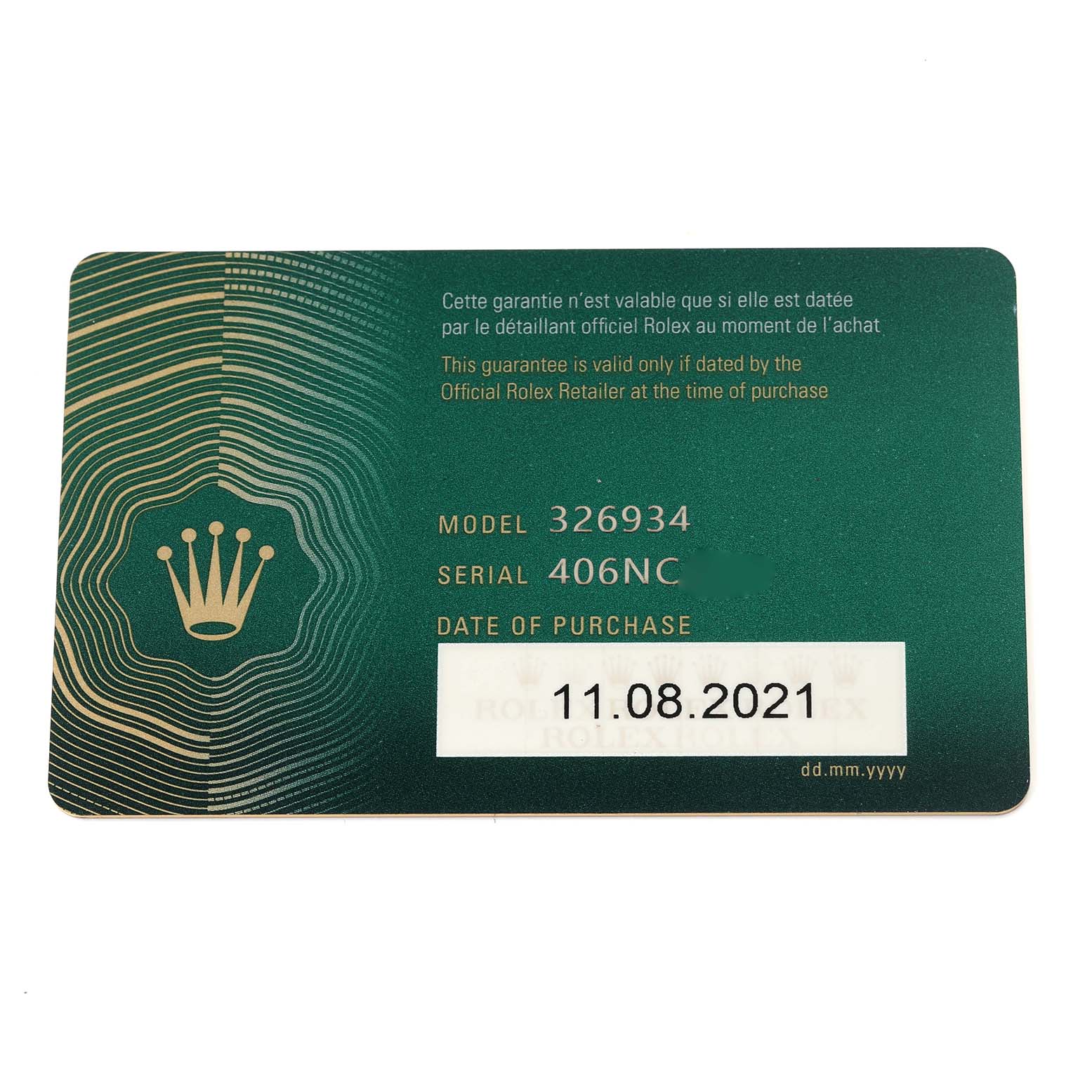 The image shows a Rolex warranty card for a Sky-Dweller model, including the model number, serial number, and purchase date.