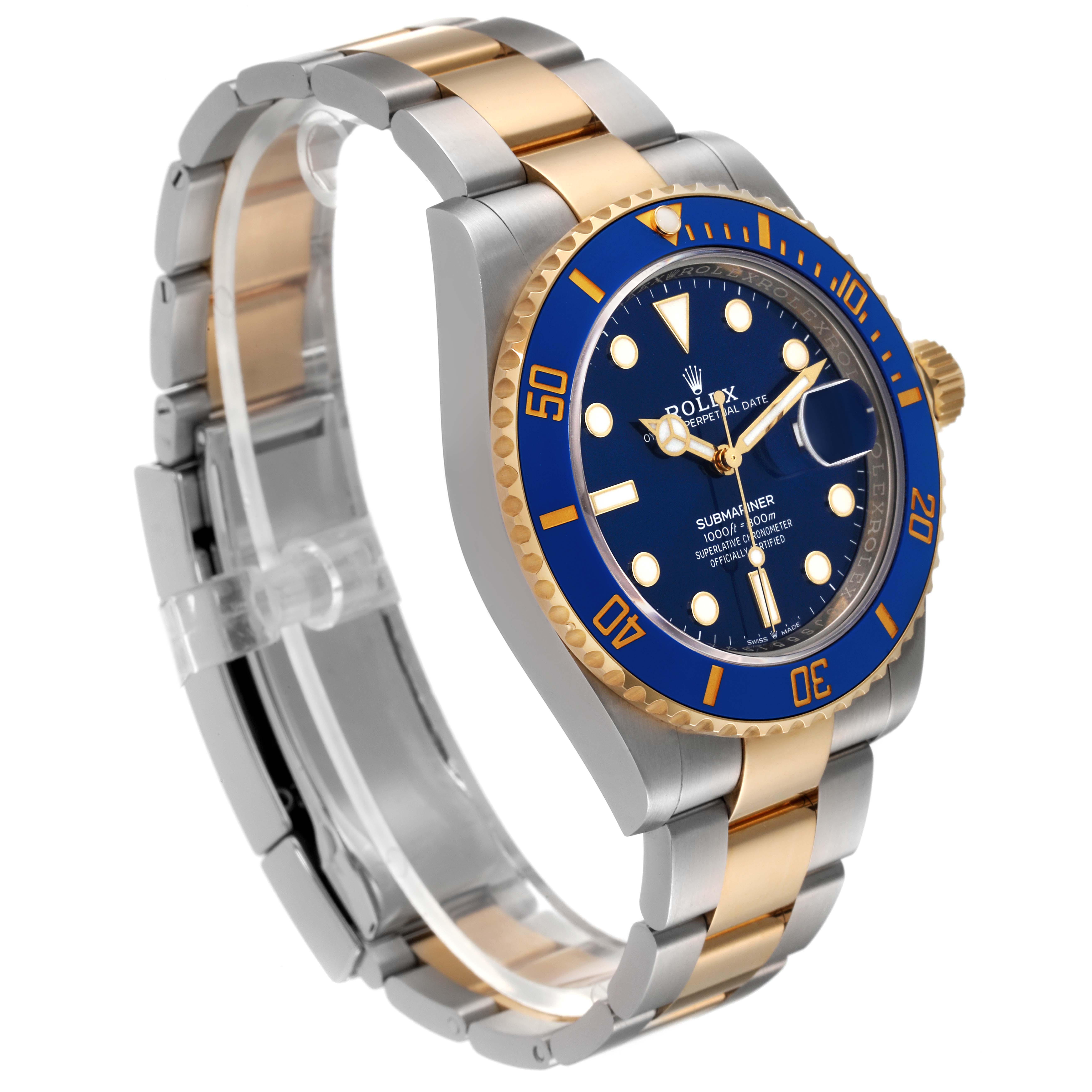 The Rolex Submariner 126613 Men
s Steel and Gold (two tone) Blue Dial 126613 Men
s Steel and Gold (two tone) Blue Dial watch is shown at a three-quarter angle, highlighting the blue dial, bezel, and two-tone metal bracelet.