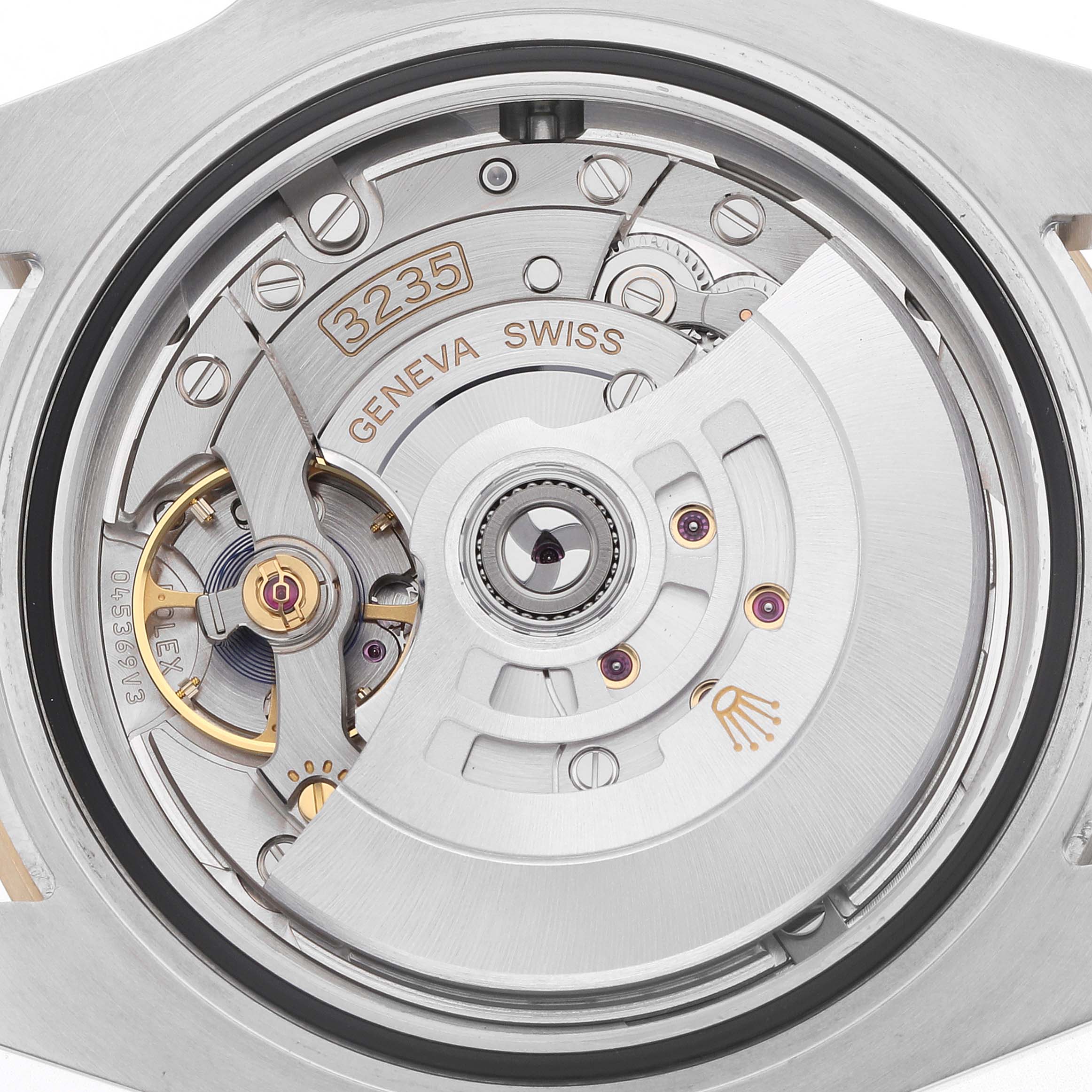 The image shows the movement mechanism of the Rolex GMT-Master 126613 Men
s Steel and Gold (two tone) Black Dial, model 3235, from a rear angle.