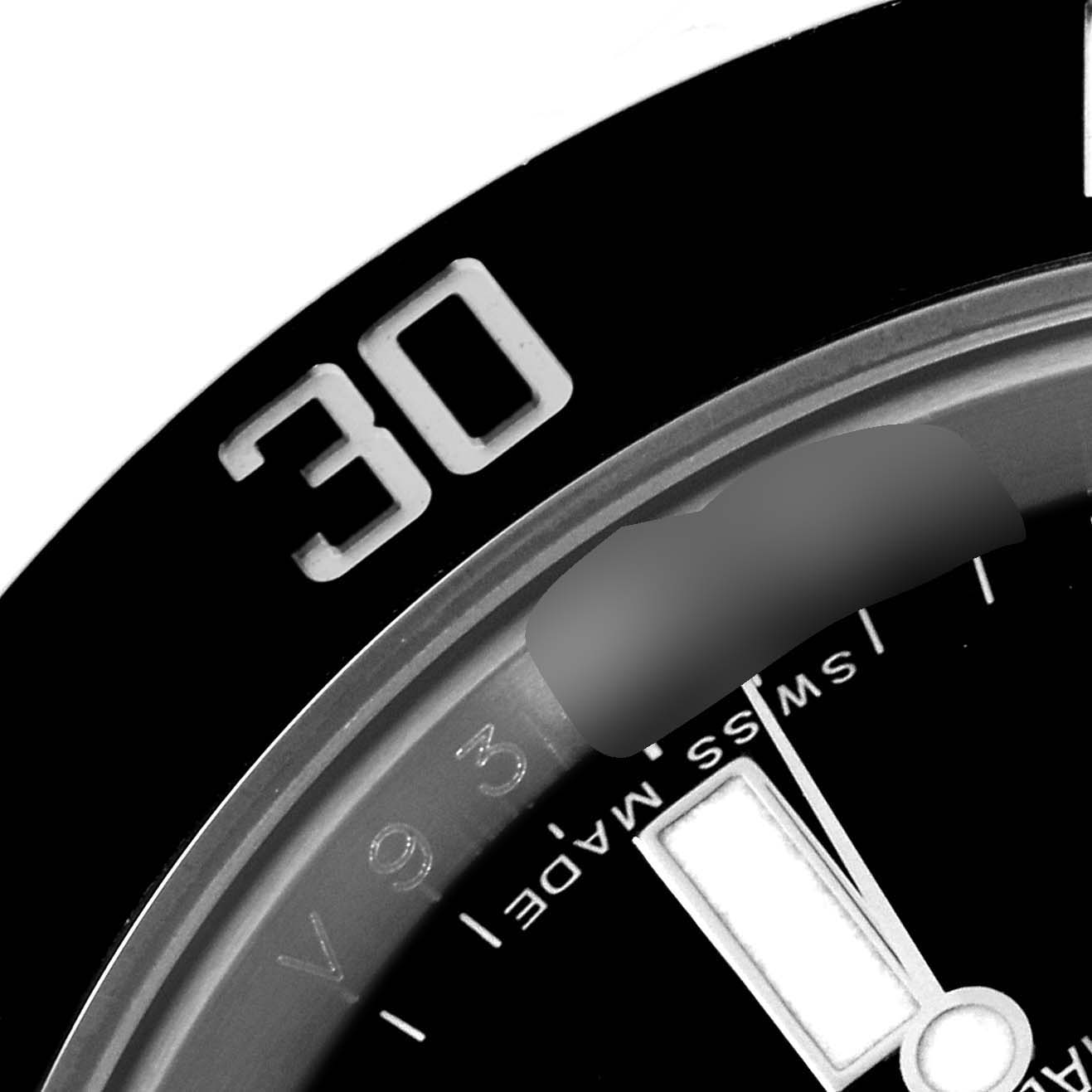 This close-up image features part of the bezel, minute markers, and the "Swiss Made" text on a Rolex Submariner 116610 Men
s Stainless Steel Black Dial 116610 Men
s Stainless Steel Black Dial watch.