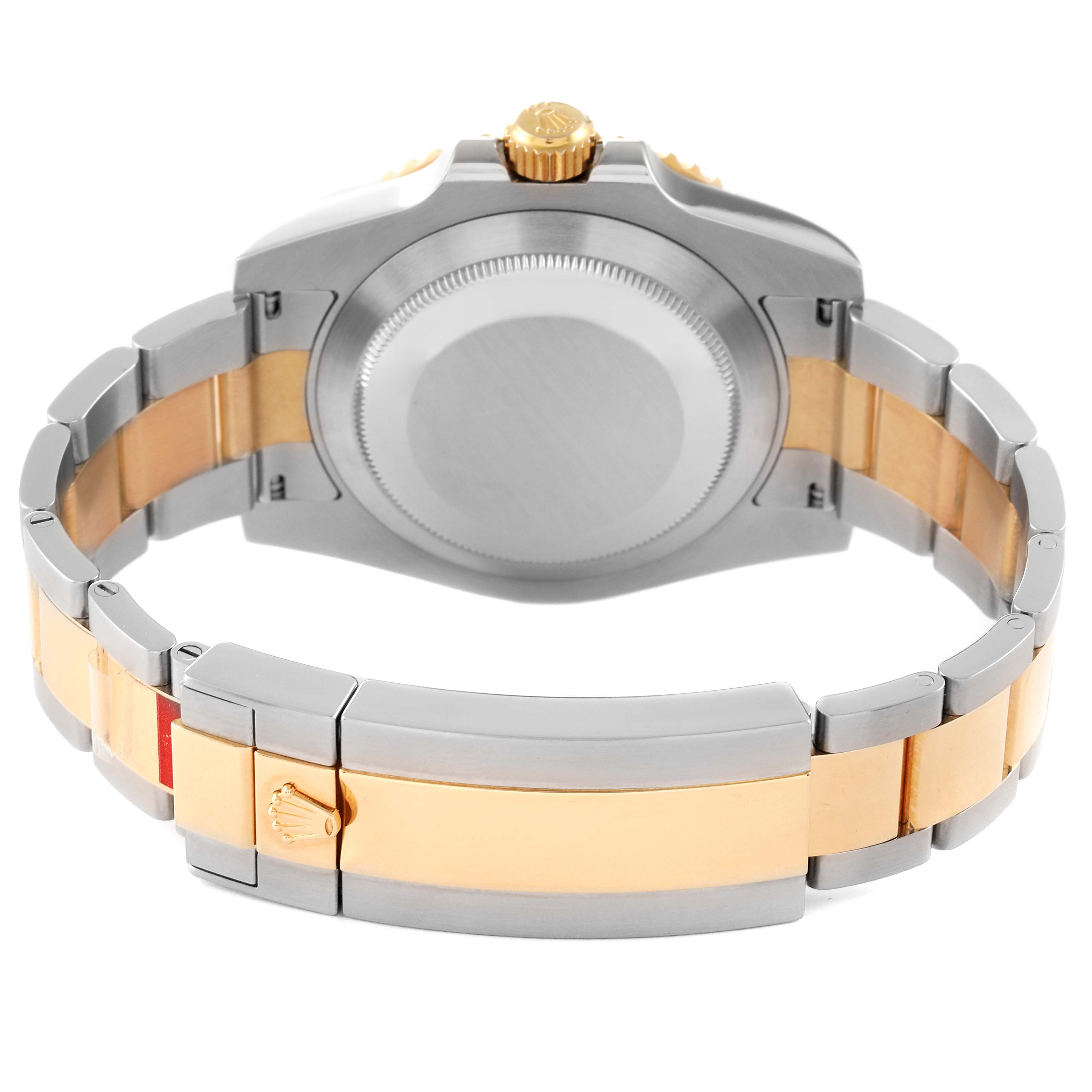 The image shows the rear view of a Rolex Submariner 116613 Men's Steel and Gold (two tone) Blue Dial 116613 Men's Steel and Gold (two tone) Blue Dial watch, focusing on the case back and two-tone bracelet with a clasp.