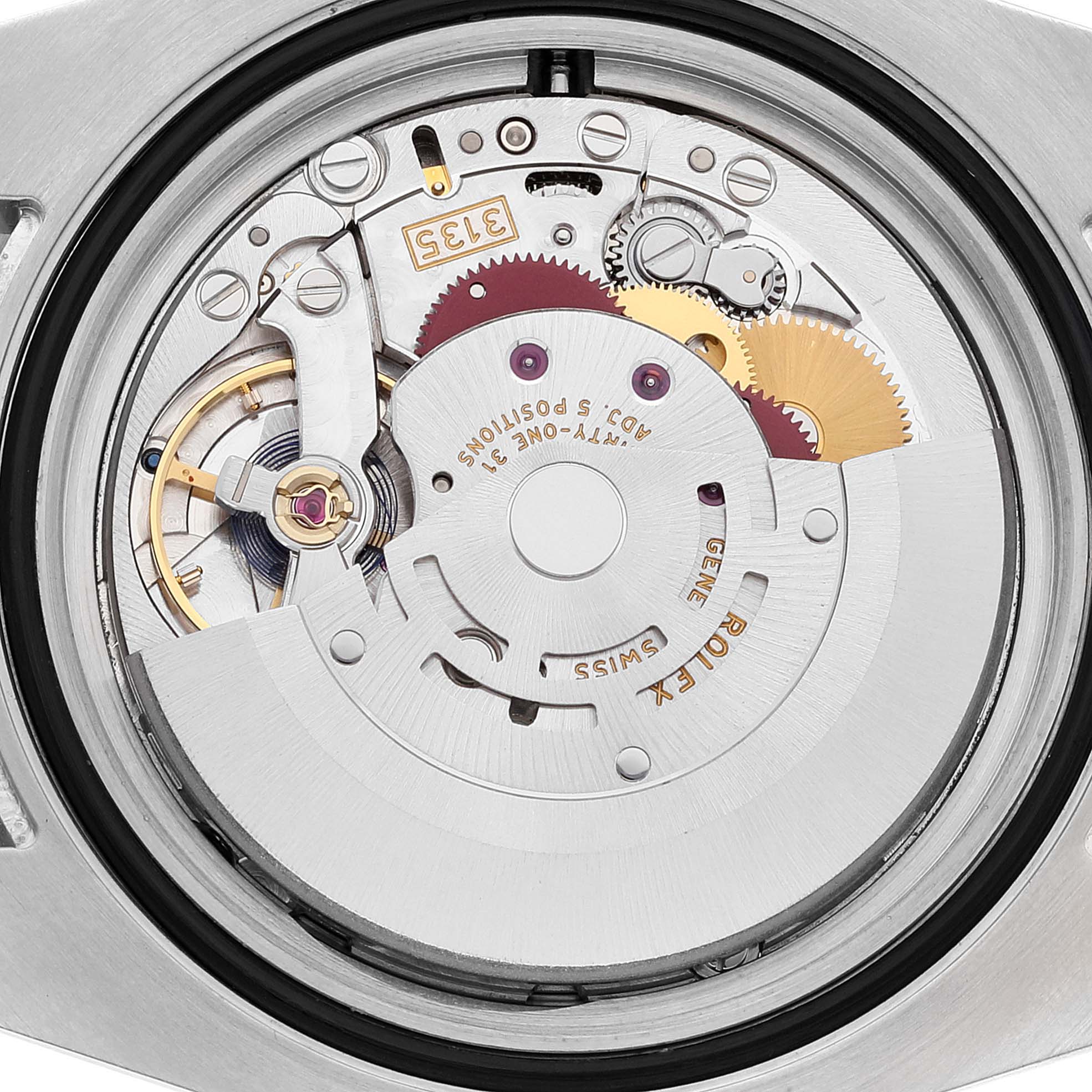 This image shows the internal movement mechanism of a Rolex Submariner 116613 Men's Steel and Gold (two tone) Blue Dial 116613 Men's Steel and Gold (two tone) Blue Dial watch from a straight-on angle.