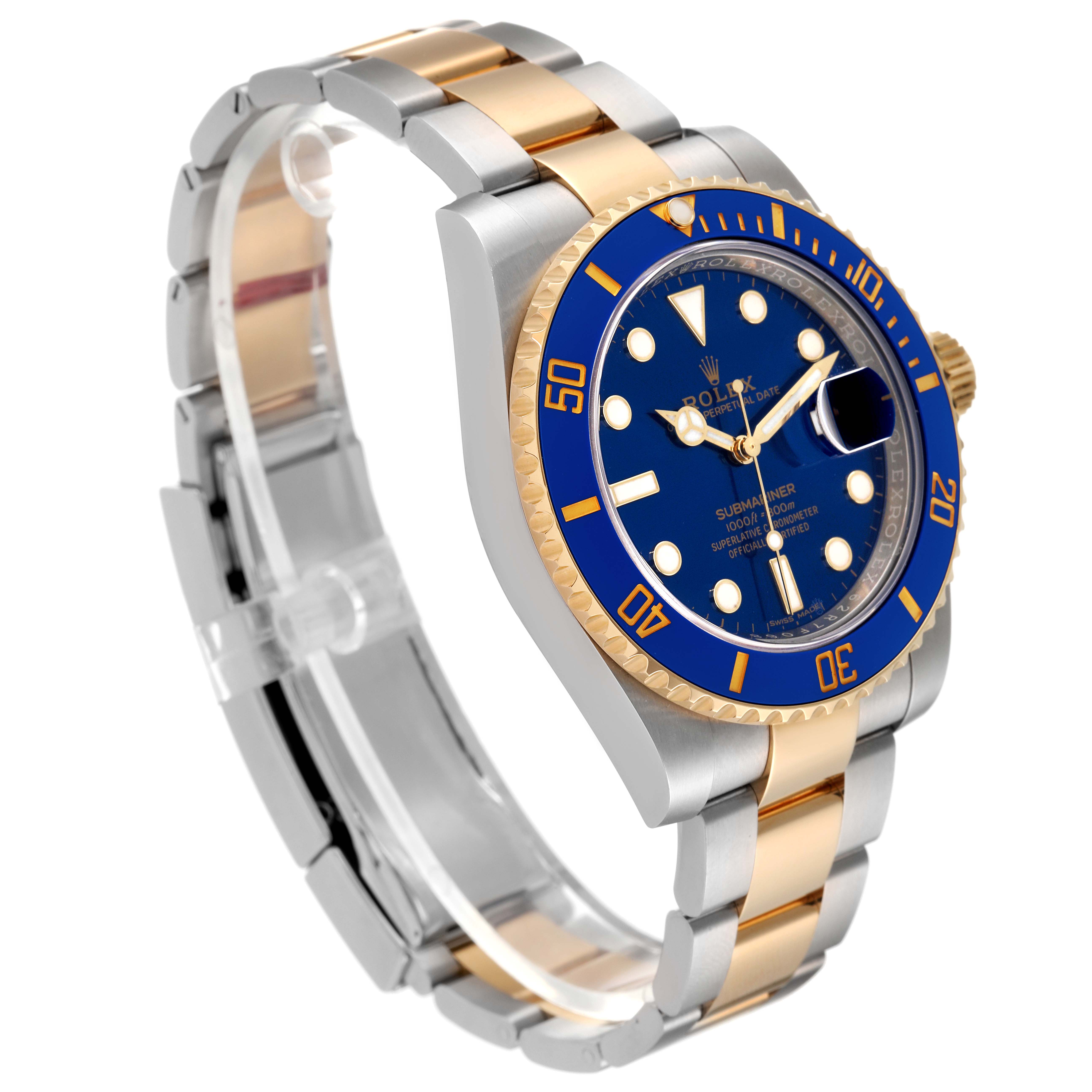 This Rolex Submariner 116613 Men's Yellow Gold Blue Dial 116613 Men's Yellow Gold Blue Dial is shown at a three-quarter angle, displaying its blue dial, bezel, and two-tone bracelet.
