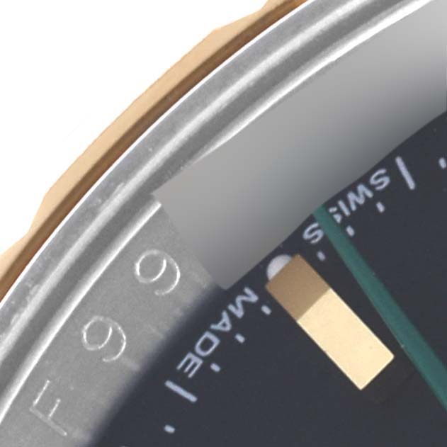 The image shows a close-up of the Rolex Turn-o-Graph 116263 Men's Steel and Gold (two tone) Black Dial 116263 Men's Steel and Gold (two tone) Black Dial watch face, focusing on the edge of the dial and markers.