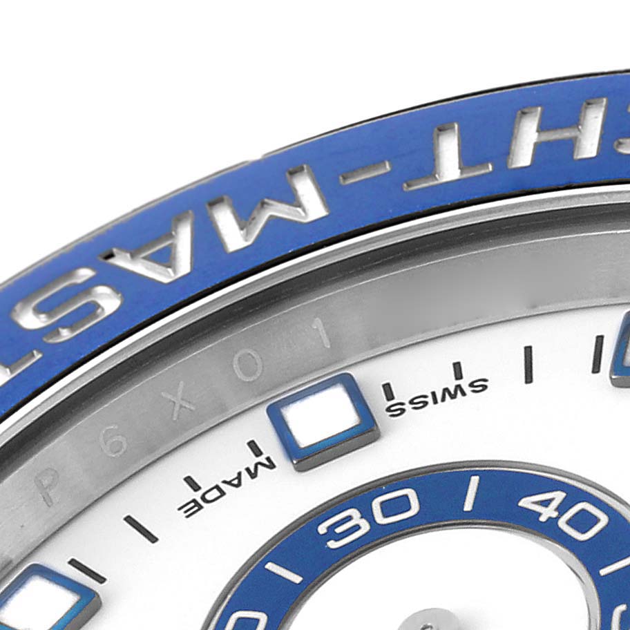 This close-up image of the Rolex Yacht-Master 116680 Men's Stainless Steel White Dial 116680 Men's Stainless Steel White Dial shows the bezel and part of the watch dial, highlighting the brand name.