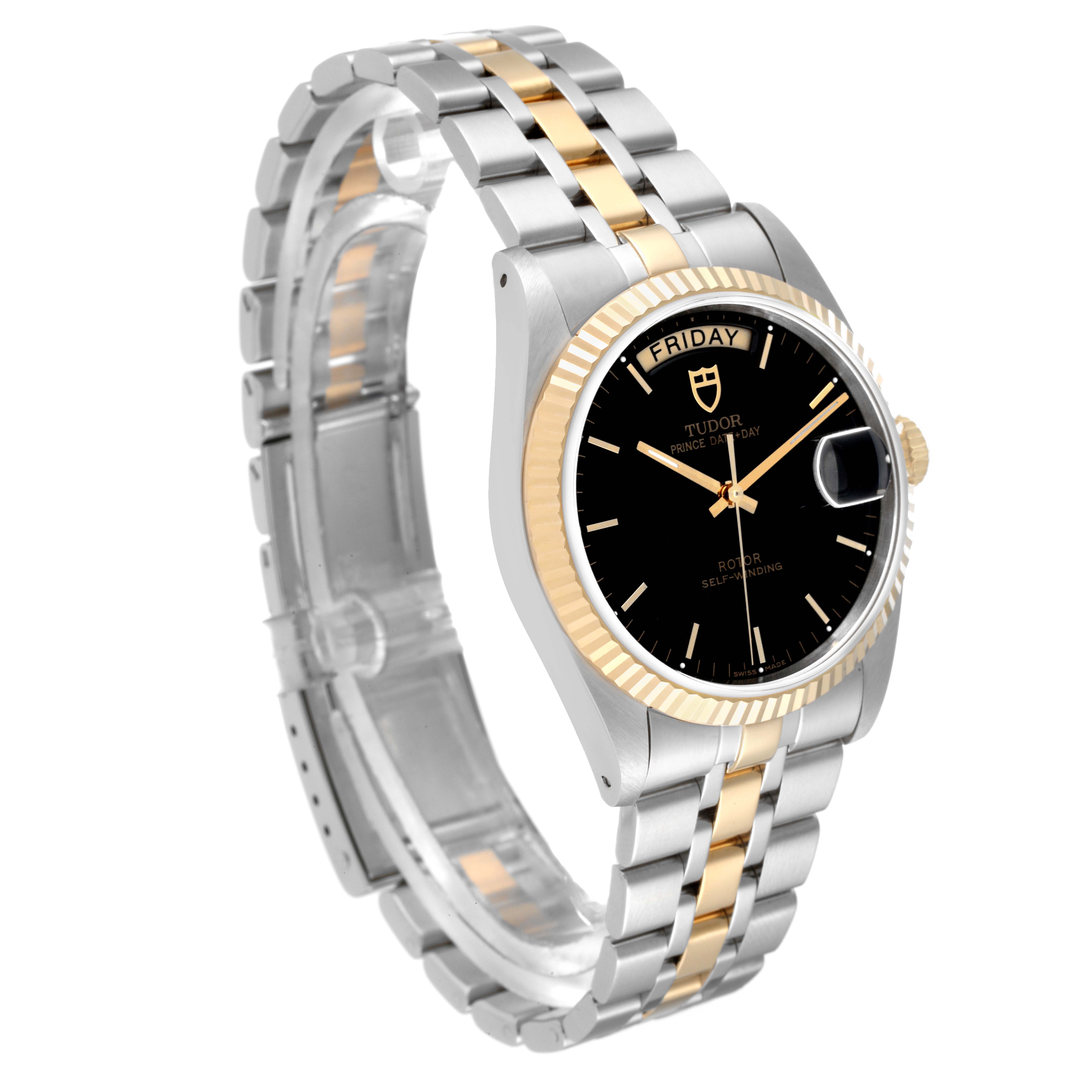 The image shows a side view of a Tudor Prince 76213 Men's Steel and Gold (two tone) Black Dial 76213 Men's Steel and Gold (two tone) Black Dial model watch with a gold and silver bracelet and a black dial displaying the time and date.