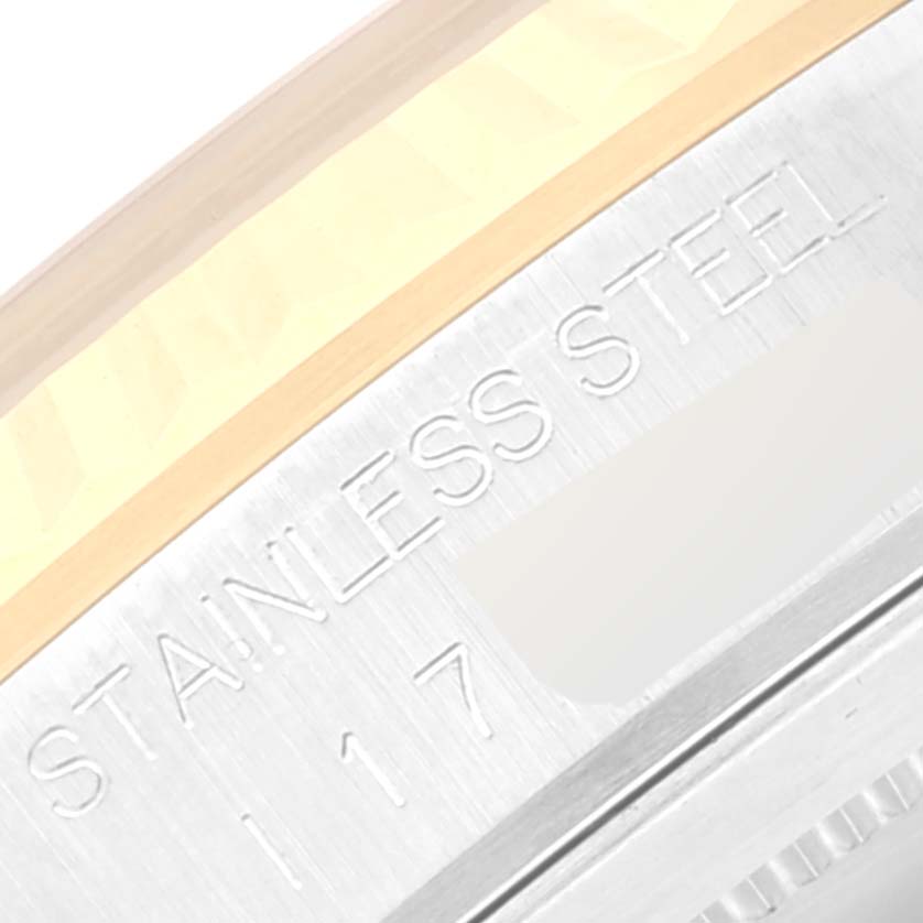 Close-up angle of the edge of the case back featuring "STAINLESS STEEL" engraving on a Tudor Prince 76213 Men's Steel and Gold (two tone) Black Dial 76213 Men's Steel and Gold (two tone) Black Dial model.