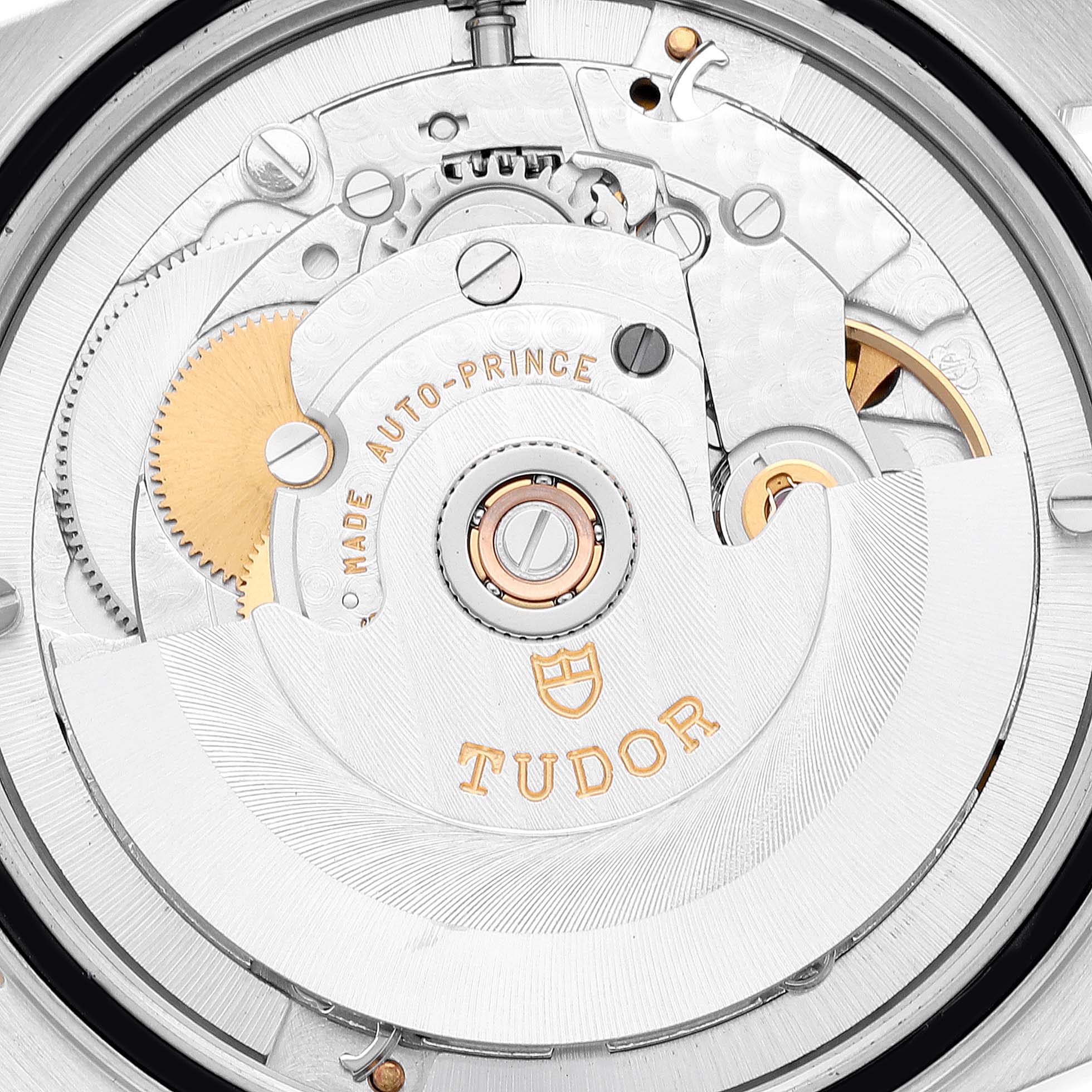 The image shows a close-up of the movement mechanism of a Tudor Prince 76213 Men's Steel and Gold (two tone) Black Dial 76213 Men's Steel and Gold (two tone) Black Dial model watch.