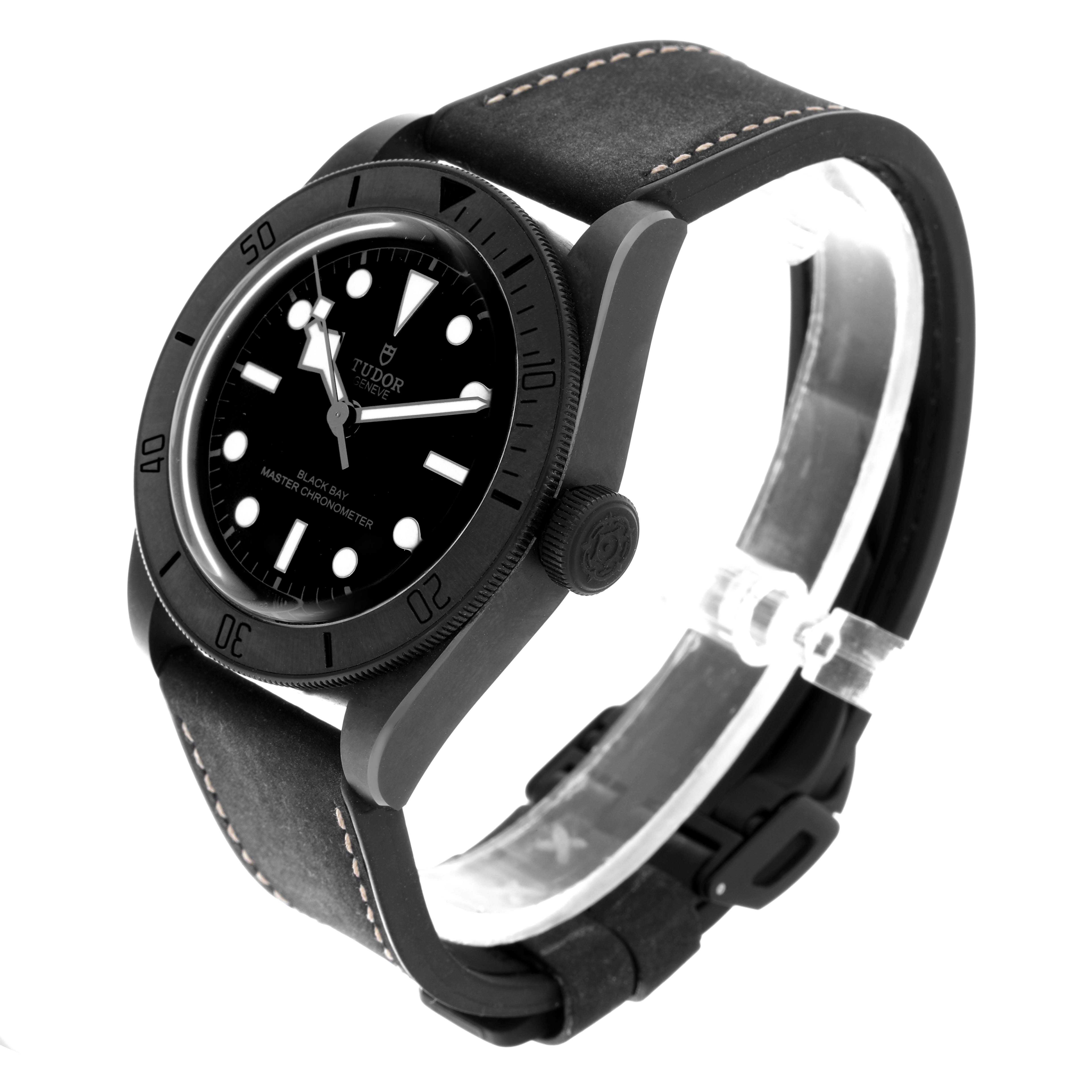 The Tudor Heritage Black Bay 79210CNU Men's Ceramic Black Dial 79210CNU Men's Ceramic Black Dial is shown at a front-right angle, highlighting the case, dial, and strap.