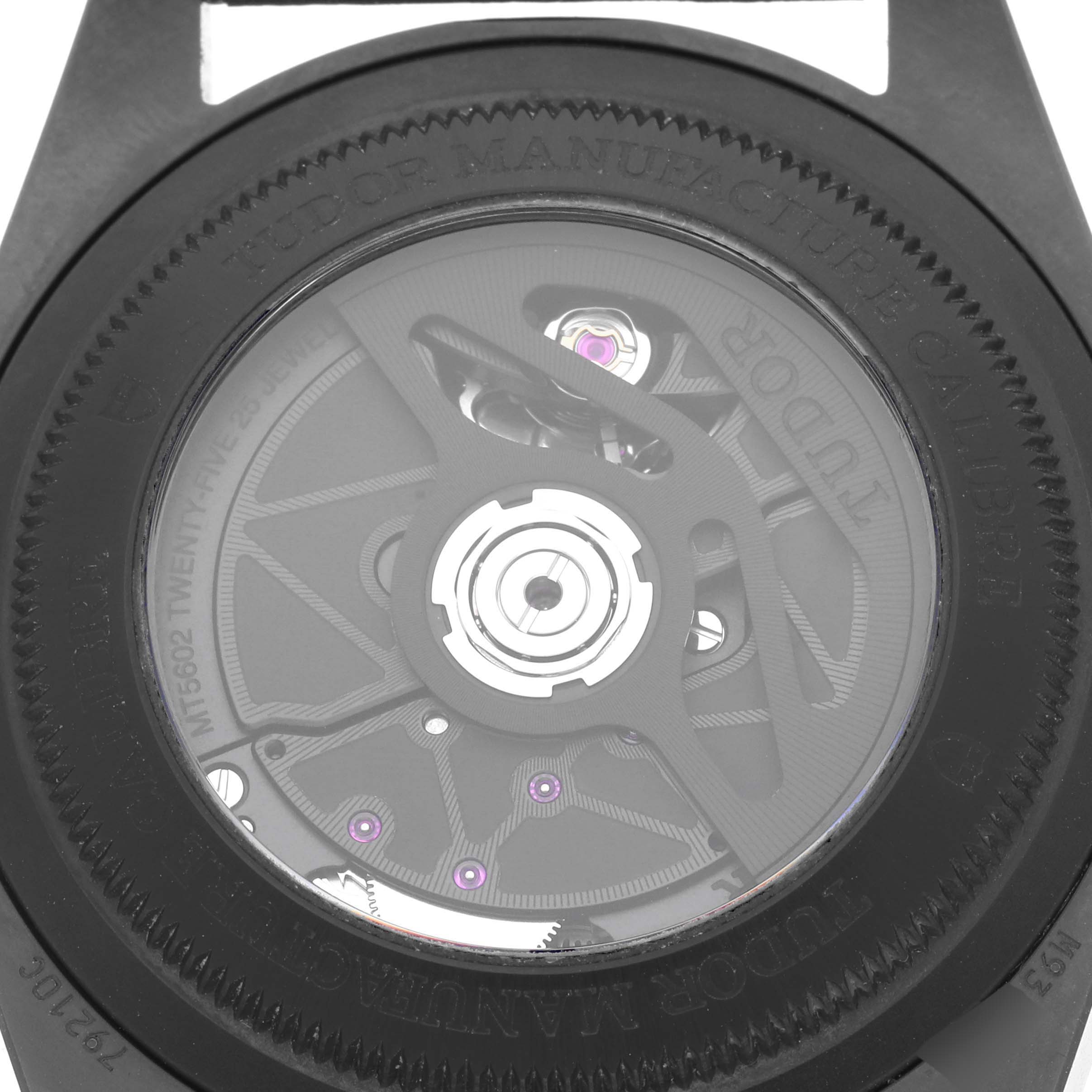 The image shows the back view of the Tudor Heritage Black Bay 79210CNU Men's Ceramic Black Dial 79210CNU Men's Ceramic Black Dial watch, highlighting its movement and components.