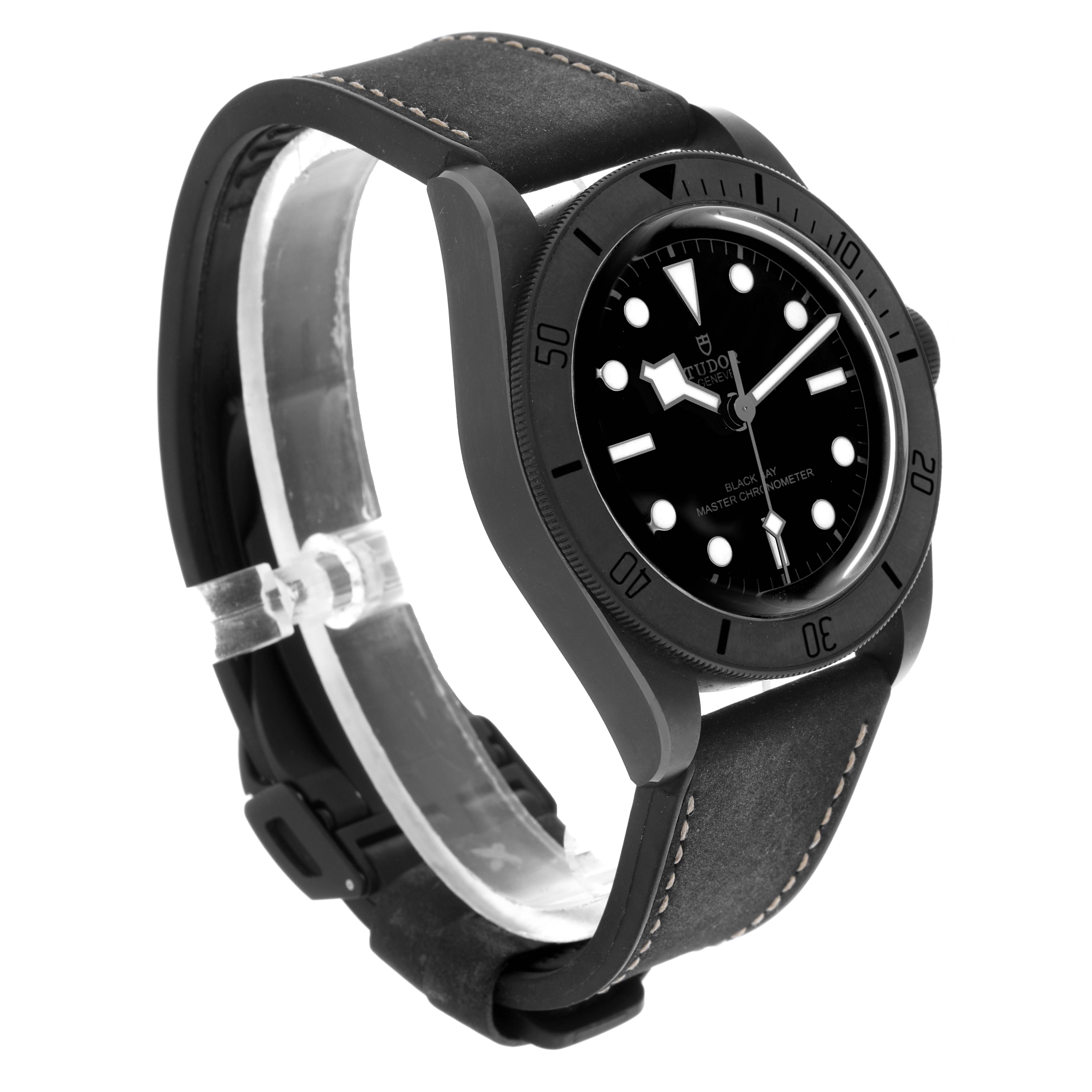 The Tudor Heritage Black Bay 79210CNU Men's Ceramic Black Dial 79210CNU Men's Ceramic Black Dial watch is shown at a three-quarter angle, displaying the face, bezel, case, and strap.