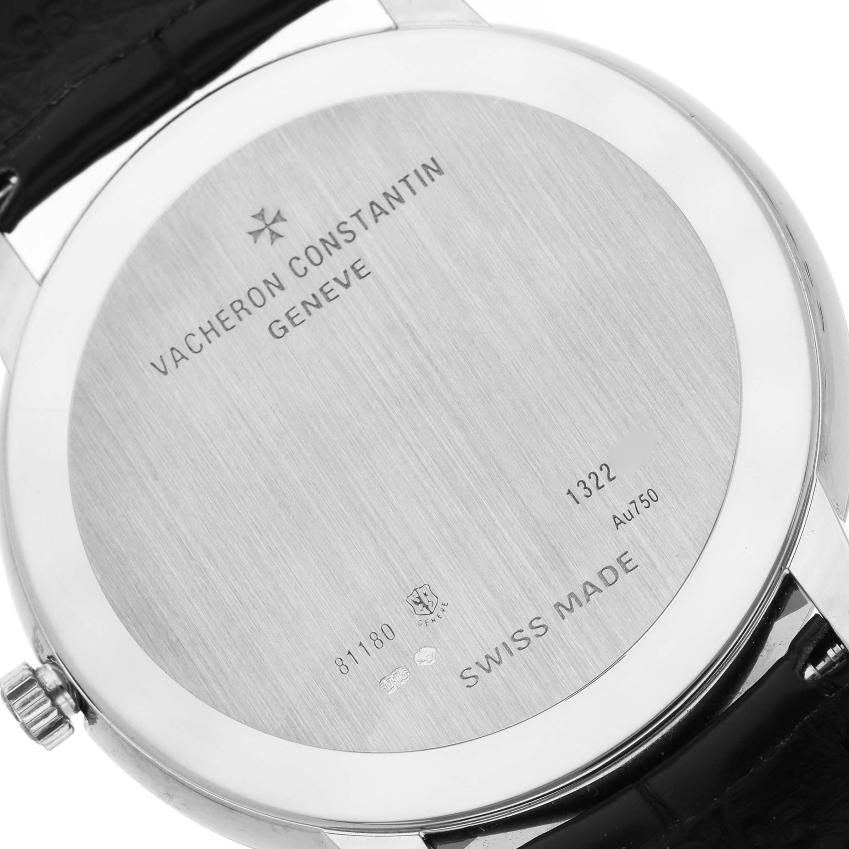 The image shows the back of the Vacheron Constantin Patrimony 81180/000G Men's White Gold Silver Dial 81180/000G Men's White Gold Silver Dial watch, featuring engraved details.