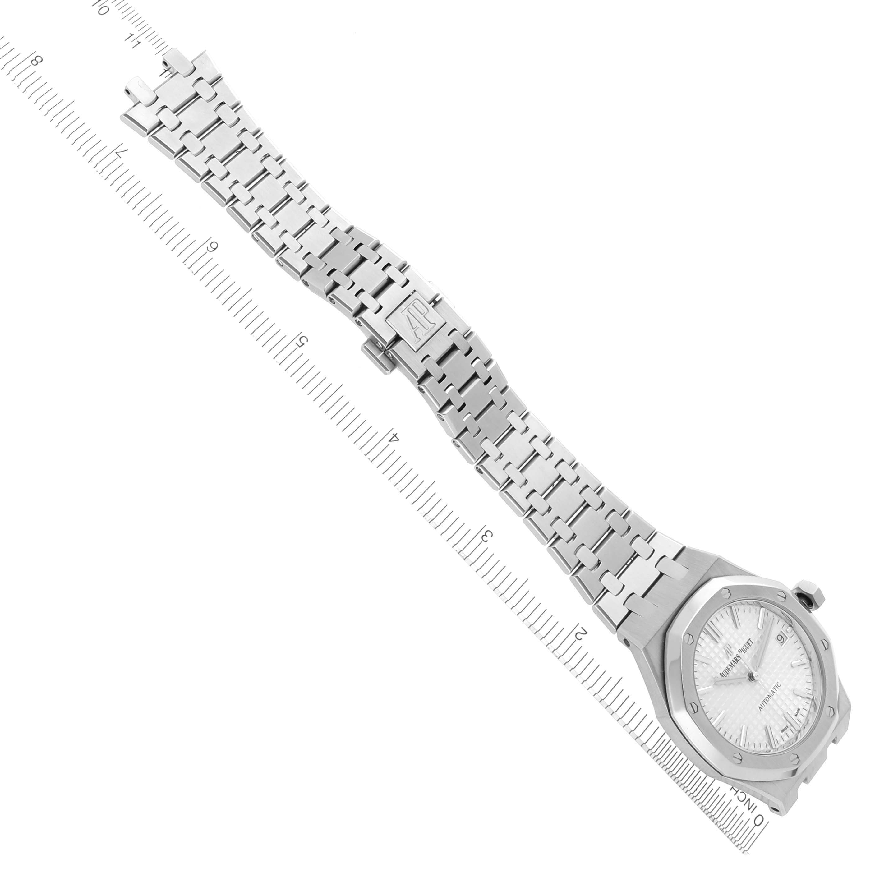 The Royal Oak by Audemars Piguet is shown from an angled top view, highlighting the bracelet, clasp, and face.