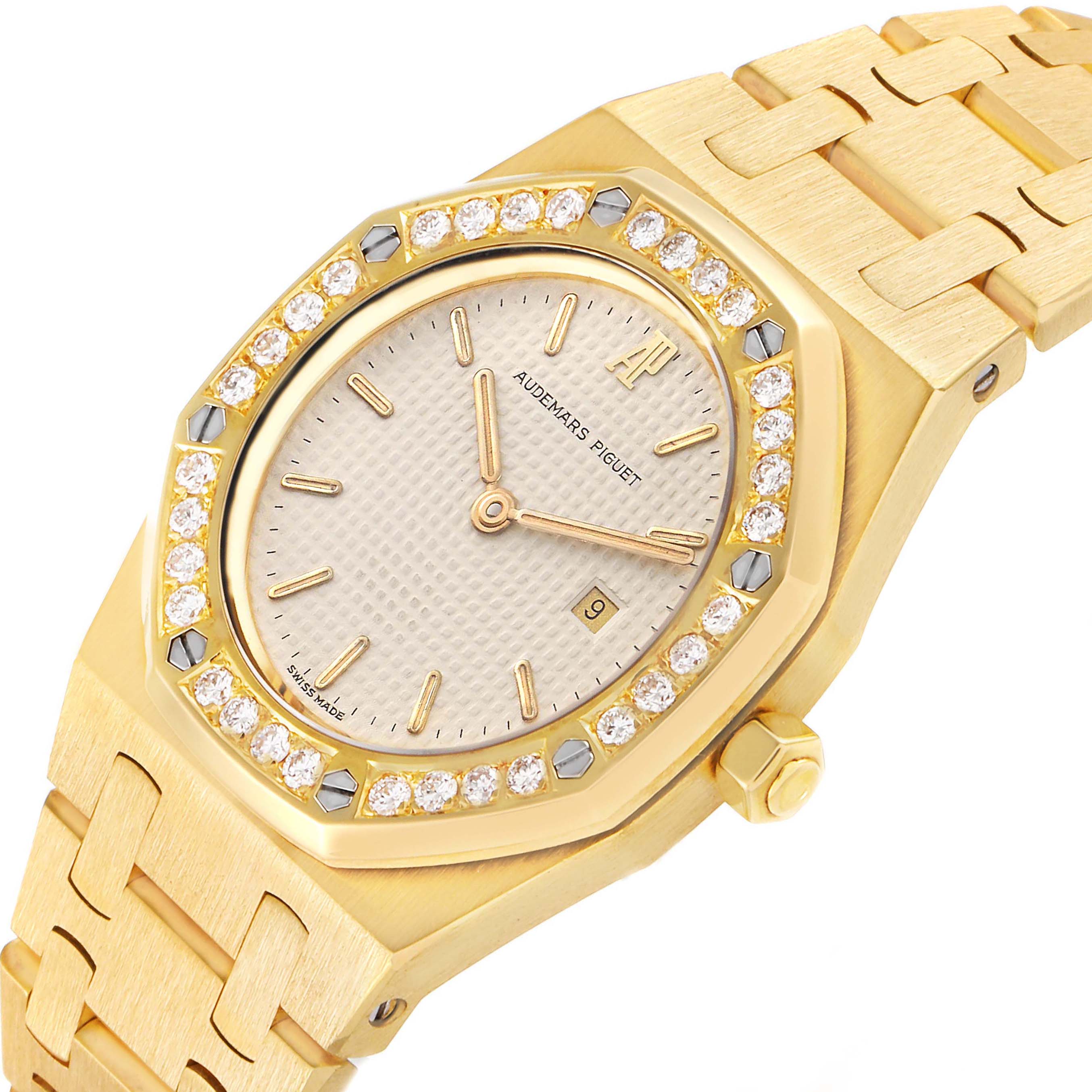 The image shows a close-up of the Audemars Piguet Royal Oak 56271BA Women
s Yellow Gold Beige Dial 56271BA Women
s Yellow Gold Beige Dial watch, highlighting the diamond bezel, dial, hands, and bracelet.