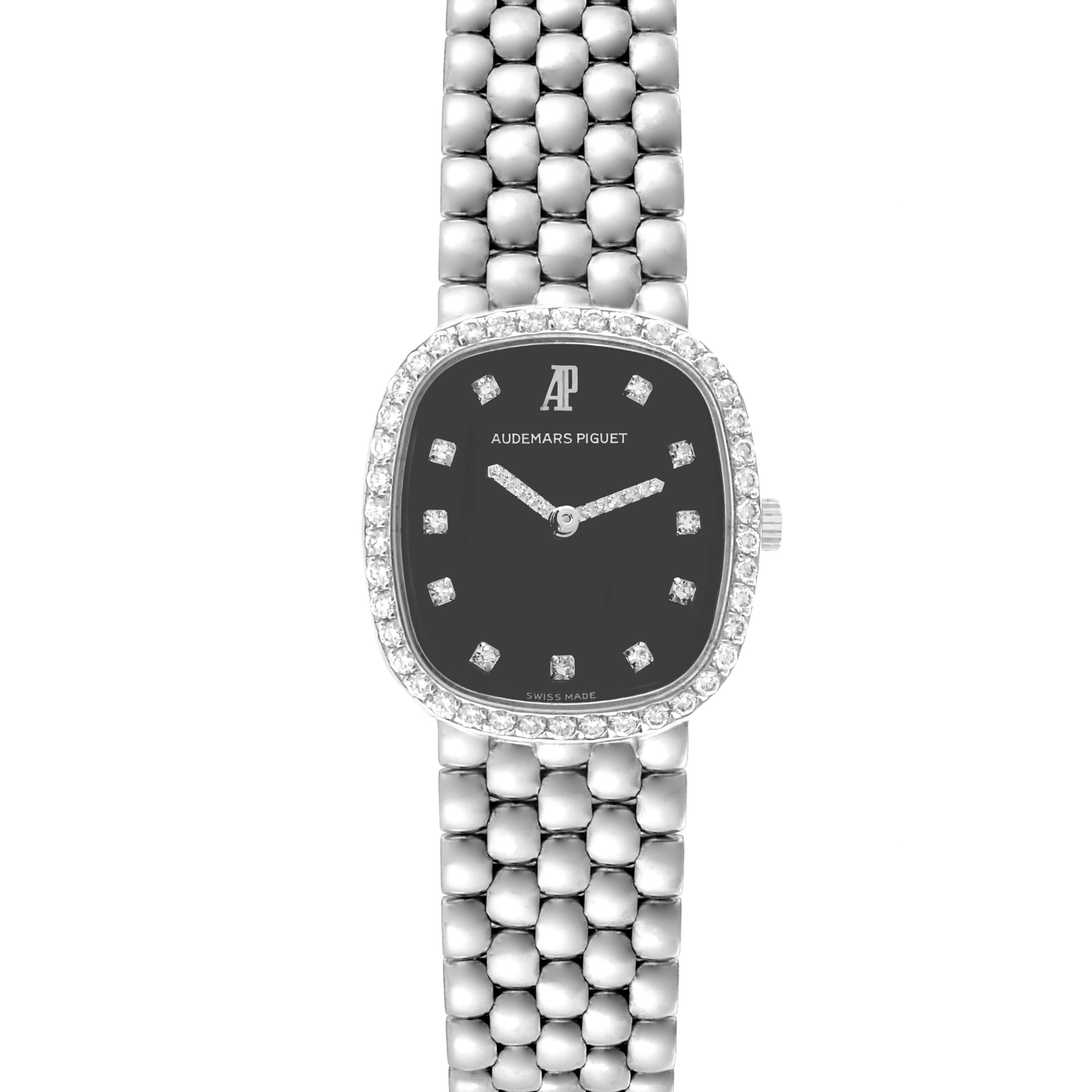 The Audemars Piguet Vintage Women's White Gold Black Dial Women's White Gold Black Dial watch is shown from a top-down angle, featuring its face, band, and bezel.