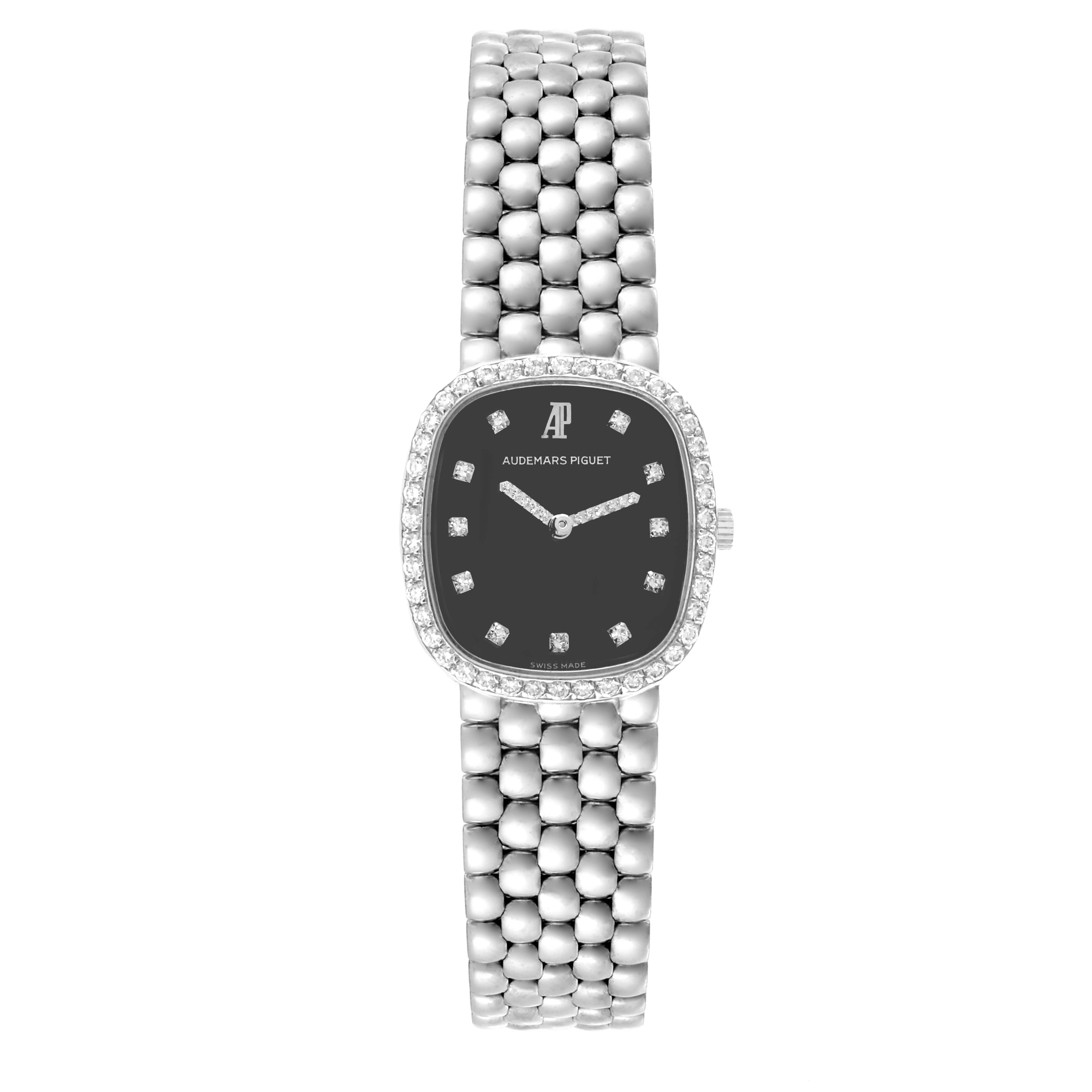 The Audemars Piguet Vintage Women's White Gold Black Dial Women's White Gold Black Dial watch is shown from a top-down angle, displaying its face and full bracelet.