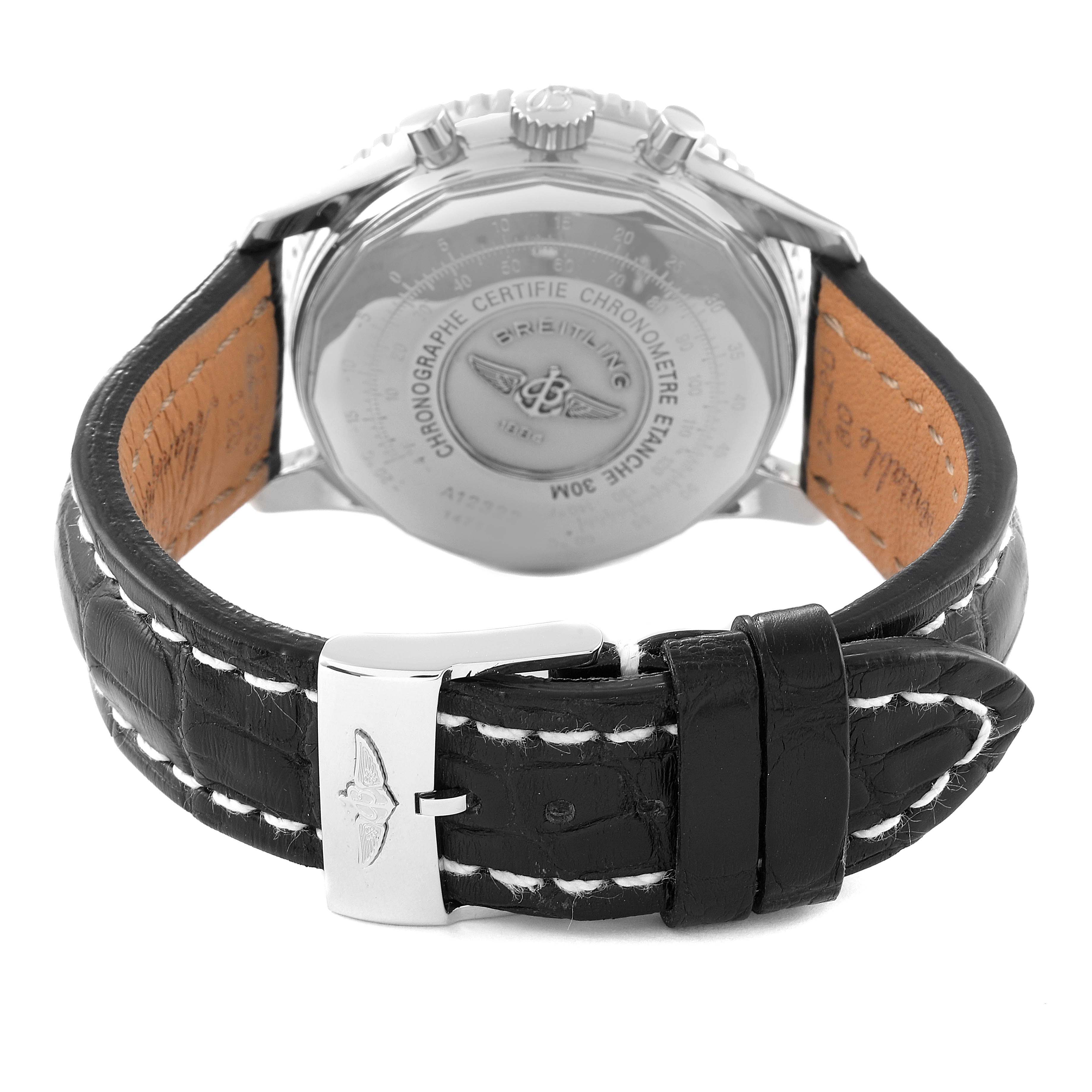 The image shows the back view of a Breitling Navitimer A12322 Men
s Stainless Steel Black Dial A12322 Men
s Stainless Steel Black Dial watch, focusing on the case back and leather strap with a clasp buckle.