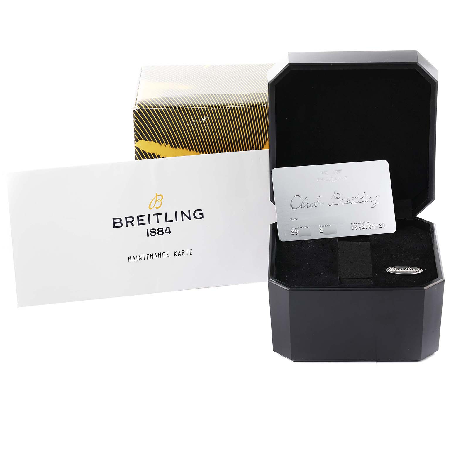 The image shows the packaging and accessories for a Breitling Navitimer A12022 Men's Stainless Steel Blue Dial A12022 Men's Stainless Steel Blue Dial, including the box, maintenance card, and a metal plaque.