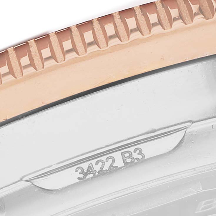 The image shows a close-up of the rose gold bezel and case edge with engraved numbers on the Breitling Superocean U10340 Men
s Stainless Steel Blue Dial watch.