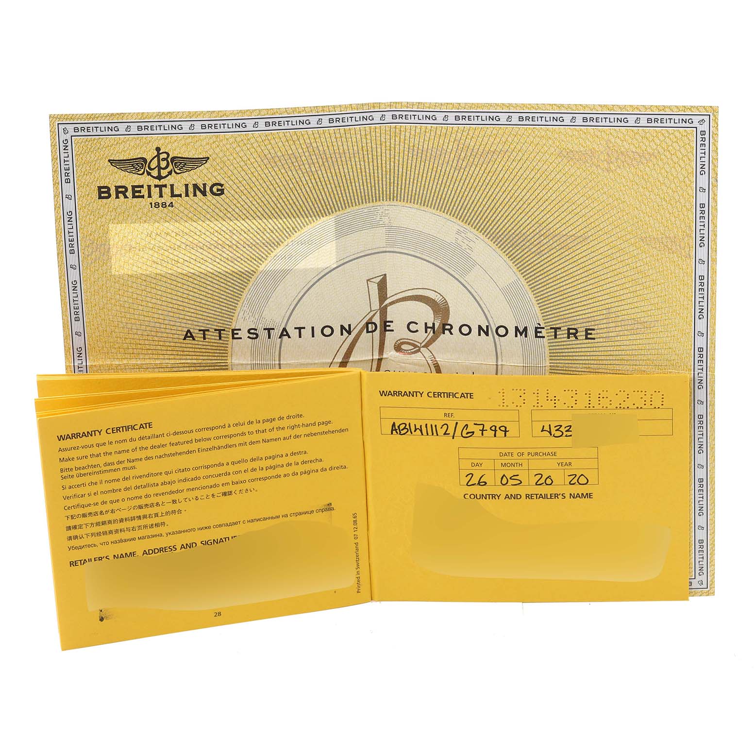 This image shows the warranty certificate and chronometer attestation for the Breitling Transocean AB141112/G799-154A Men's Stainless Steel Silver Dial AB141112/G799-154A Men's Stainless Steel Silver Dial model.