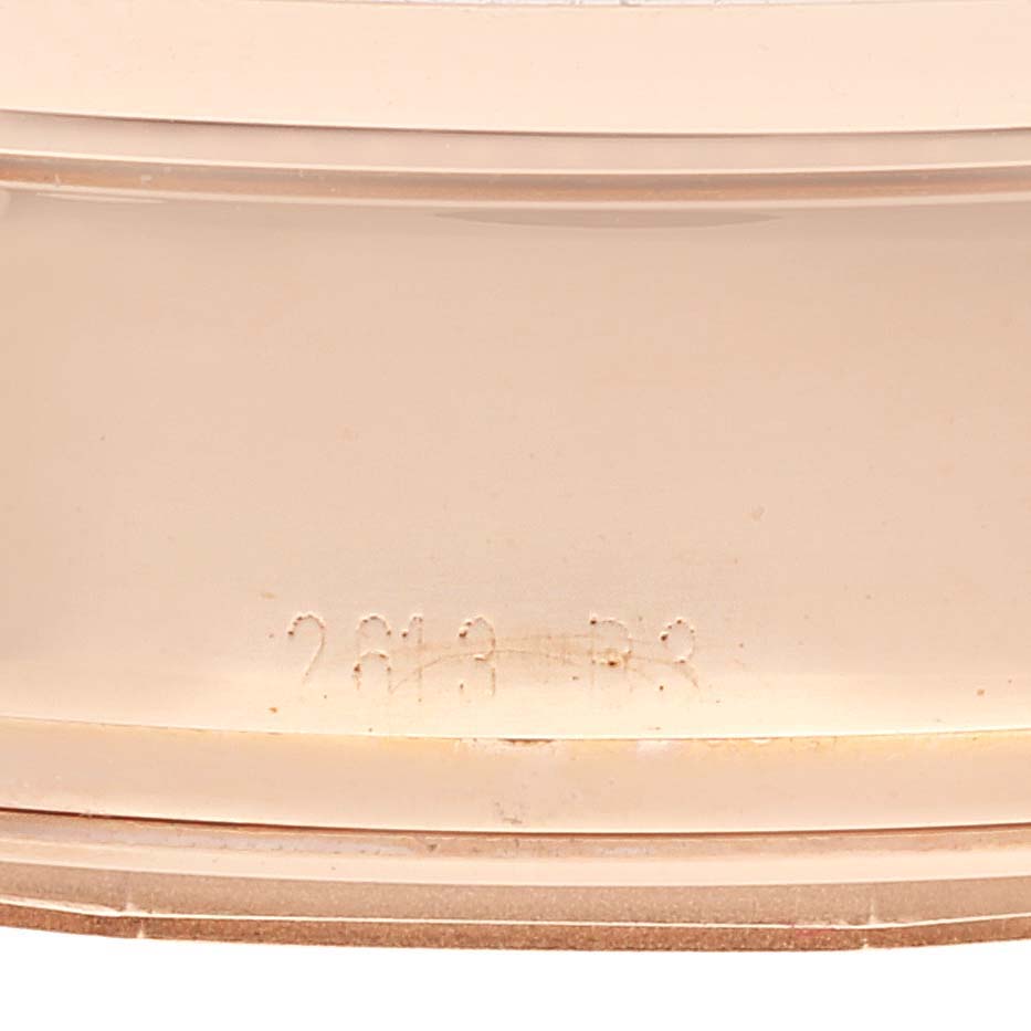 This close-up image of the Breitling Transocean RB0510 Men's Rose Gold Black Dial RB0510 Men's Rose Gold Black Dial shows the case with a partially visible reference number engraved.