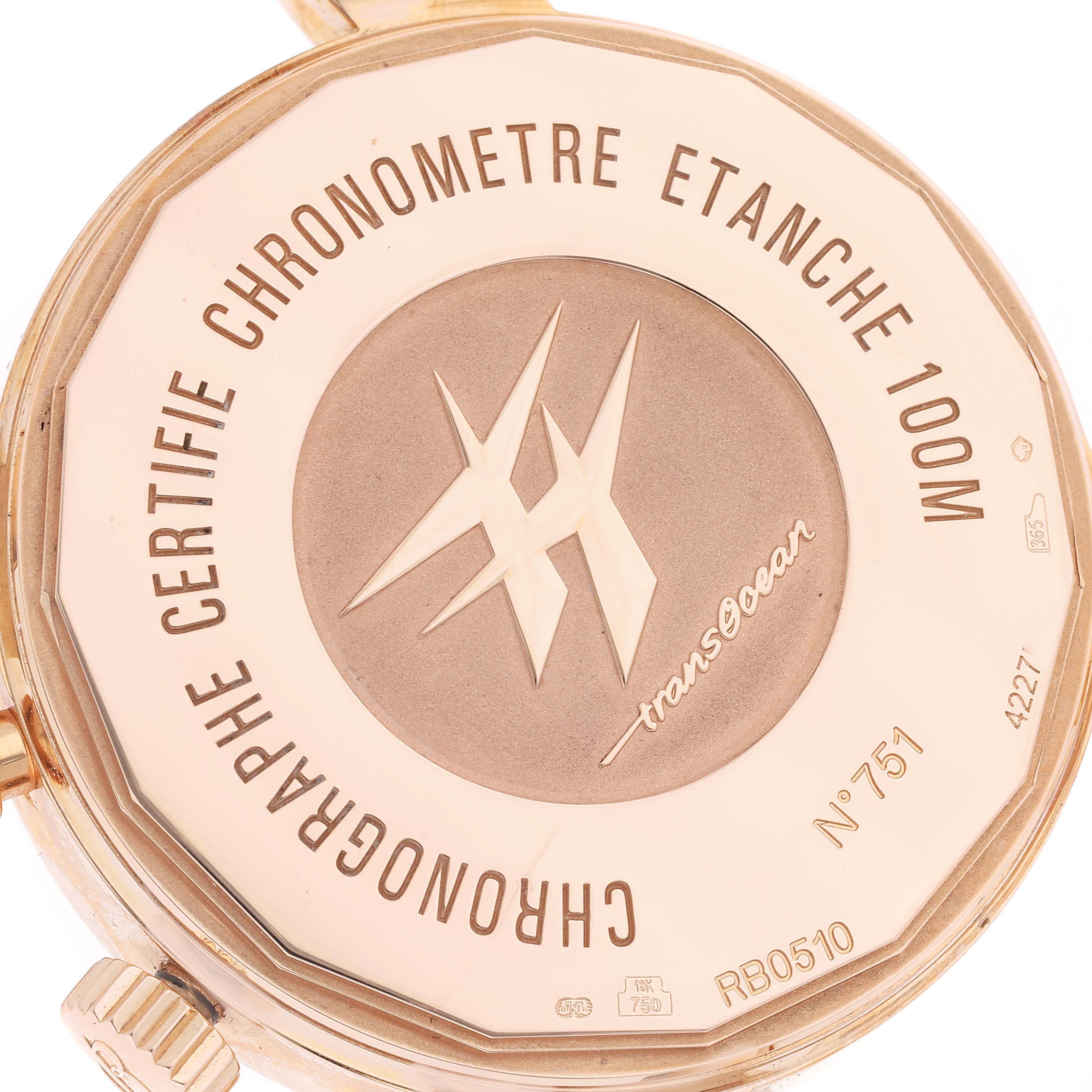 The image shows the back case of a Breitling Transocean RB0510 Men's Rose Gold Black Dial RB0510 Men's Rose Gold Black Dial watch, highlighting its engravings and certification details.