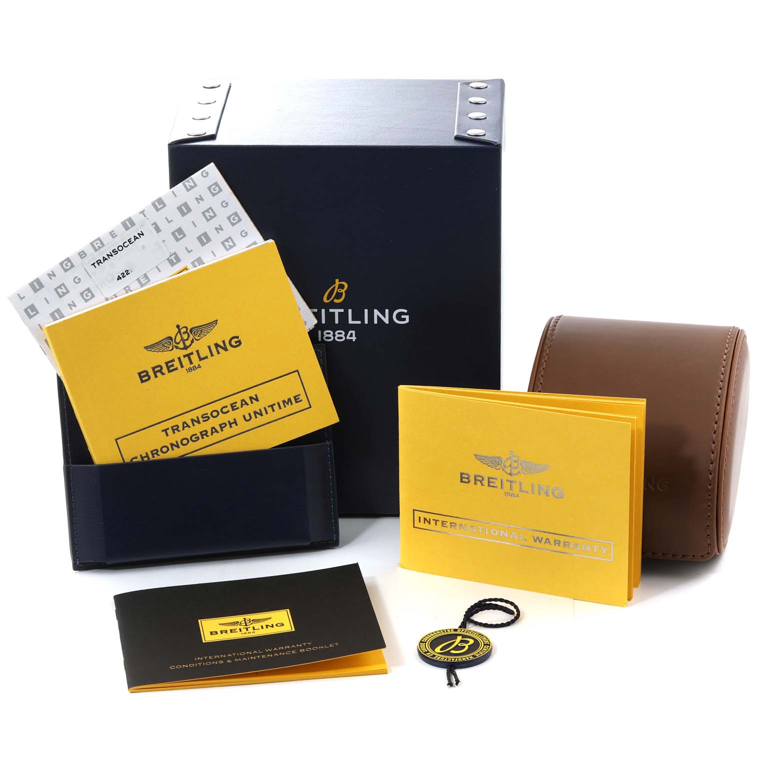 The image shows the Breitling Transocean RB0510 Men's Rose Gold Black Dial RB0510 Men's Rose Gold Black Dial packaging, including manuals, warranty cards, tag, and a leather watch case.